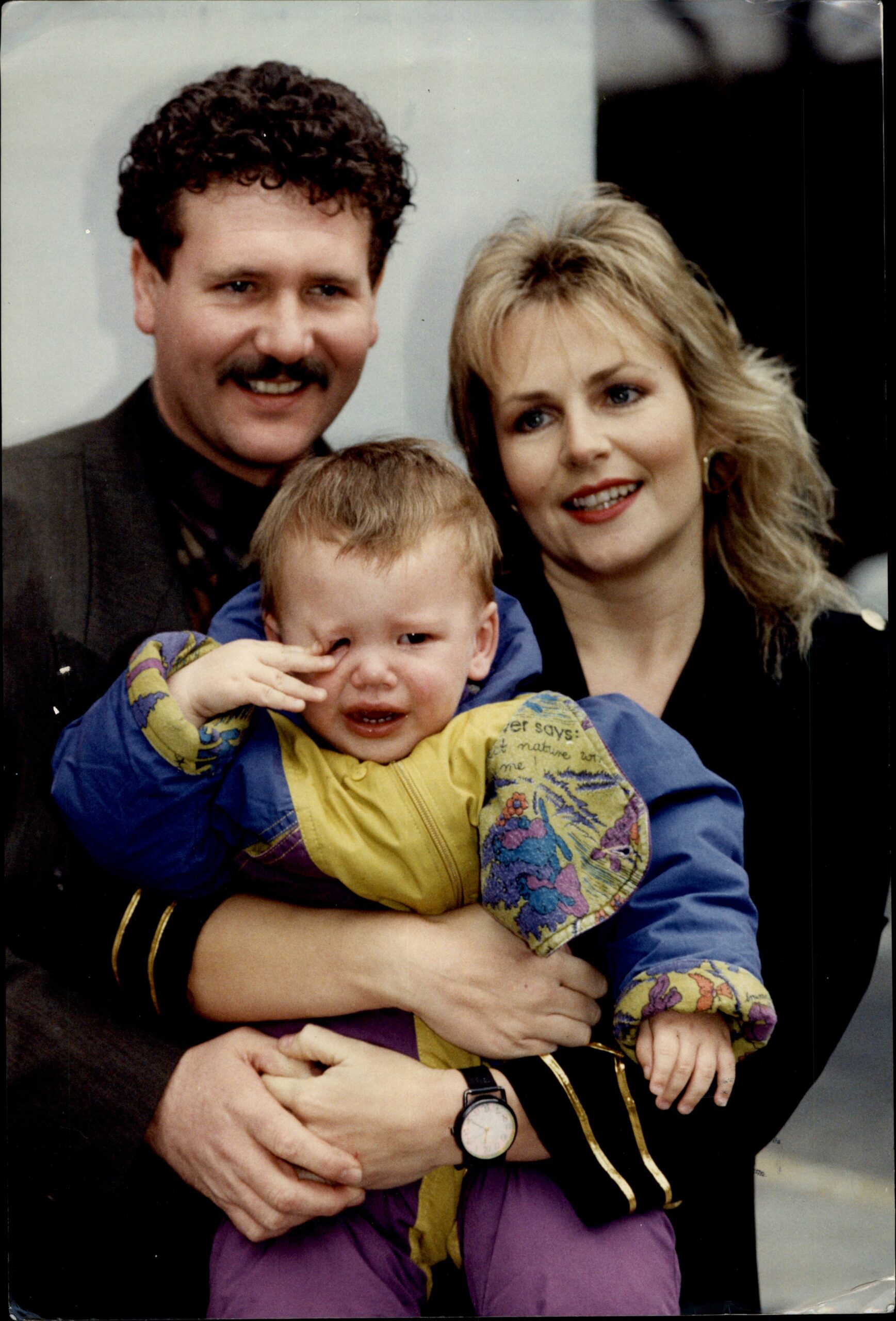 Sue Sullivan in Brookside holding her crying baby
