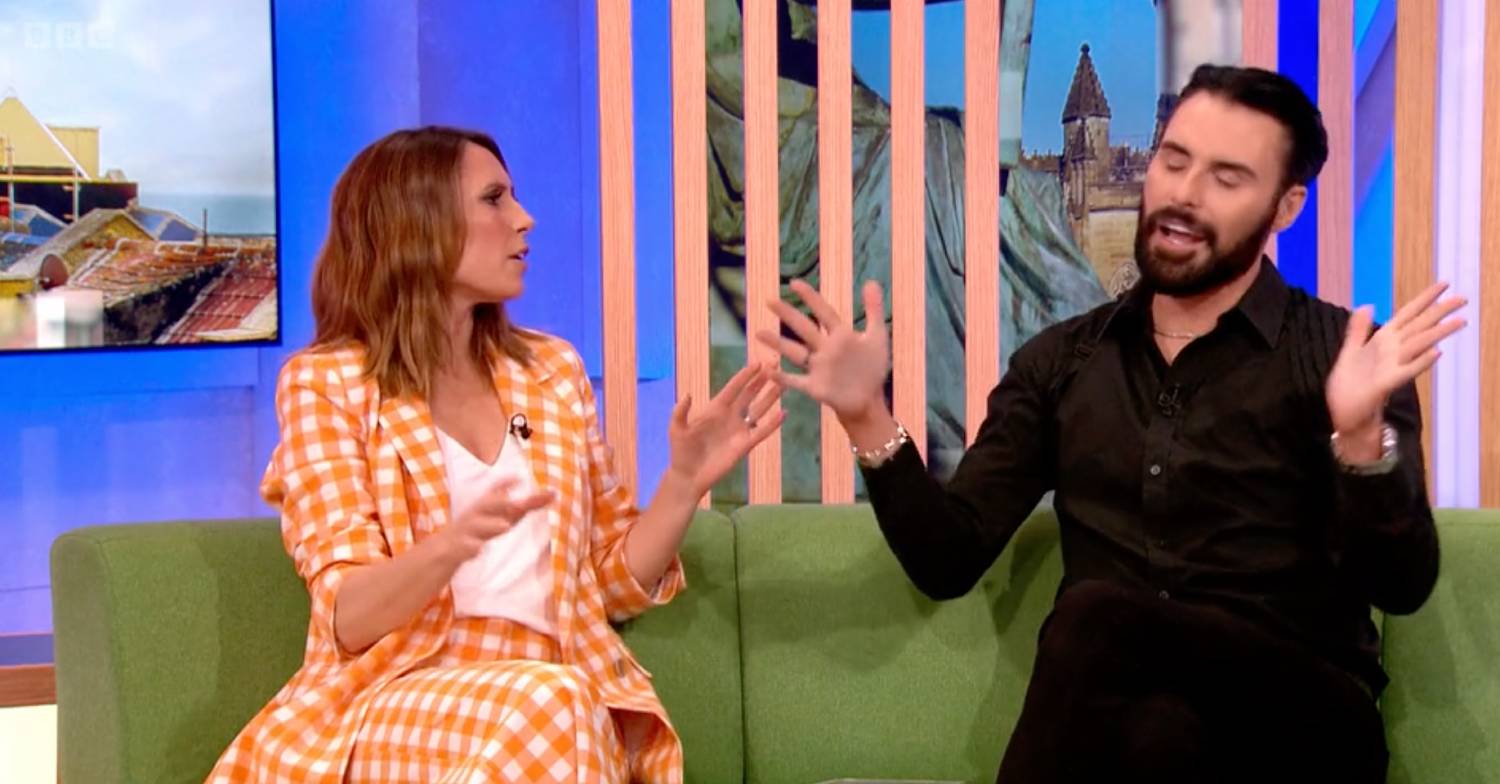 Alex Jones holds her hands up as Rylan makes his point about Celebrity Gogglebox