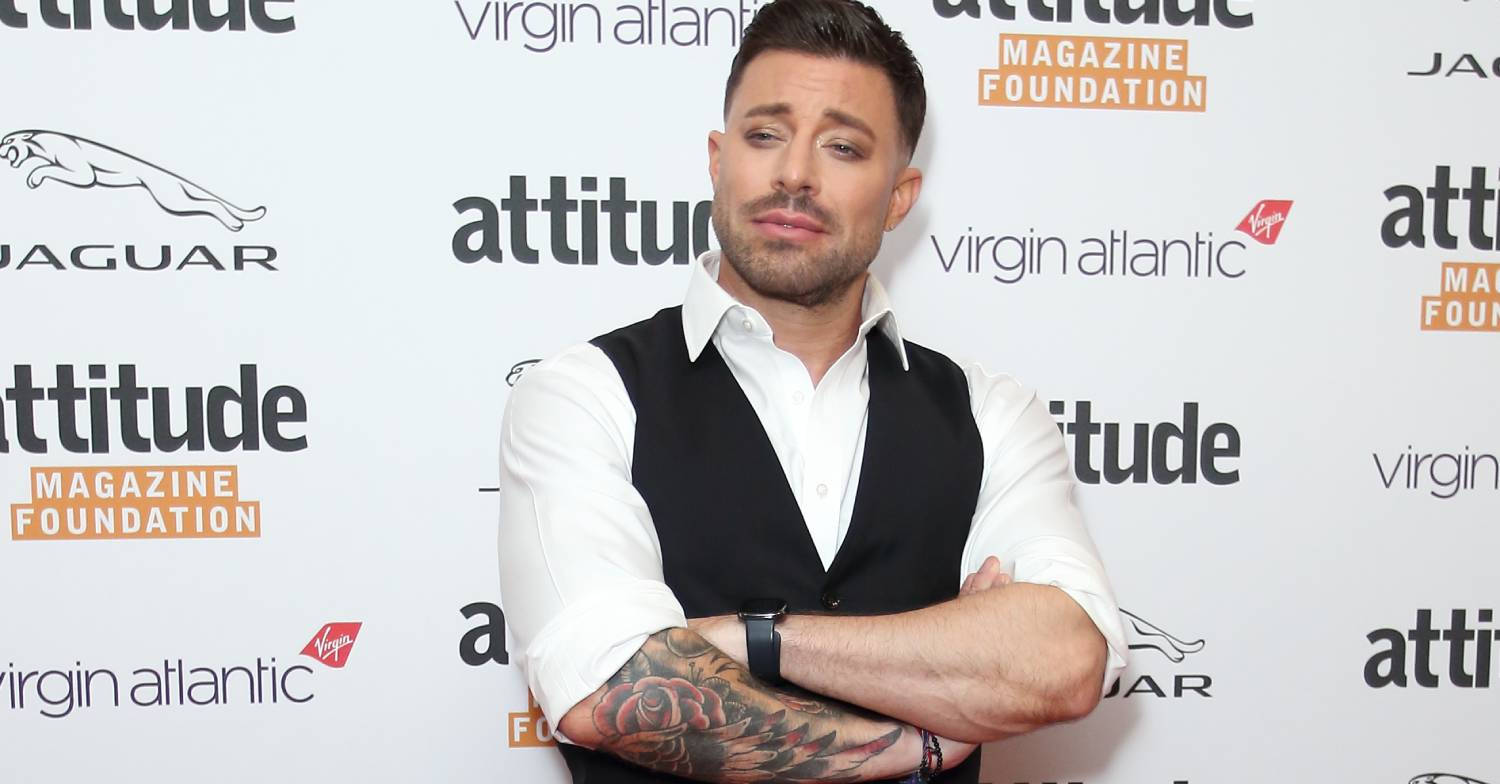 Duncan James folds his arms