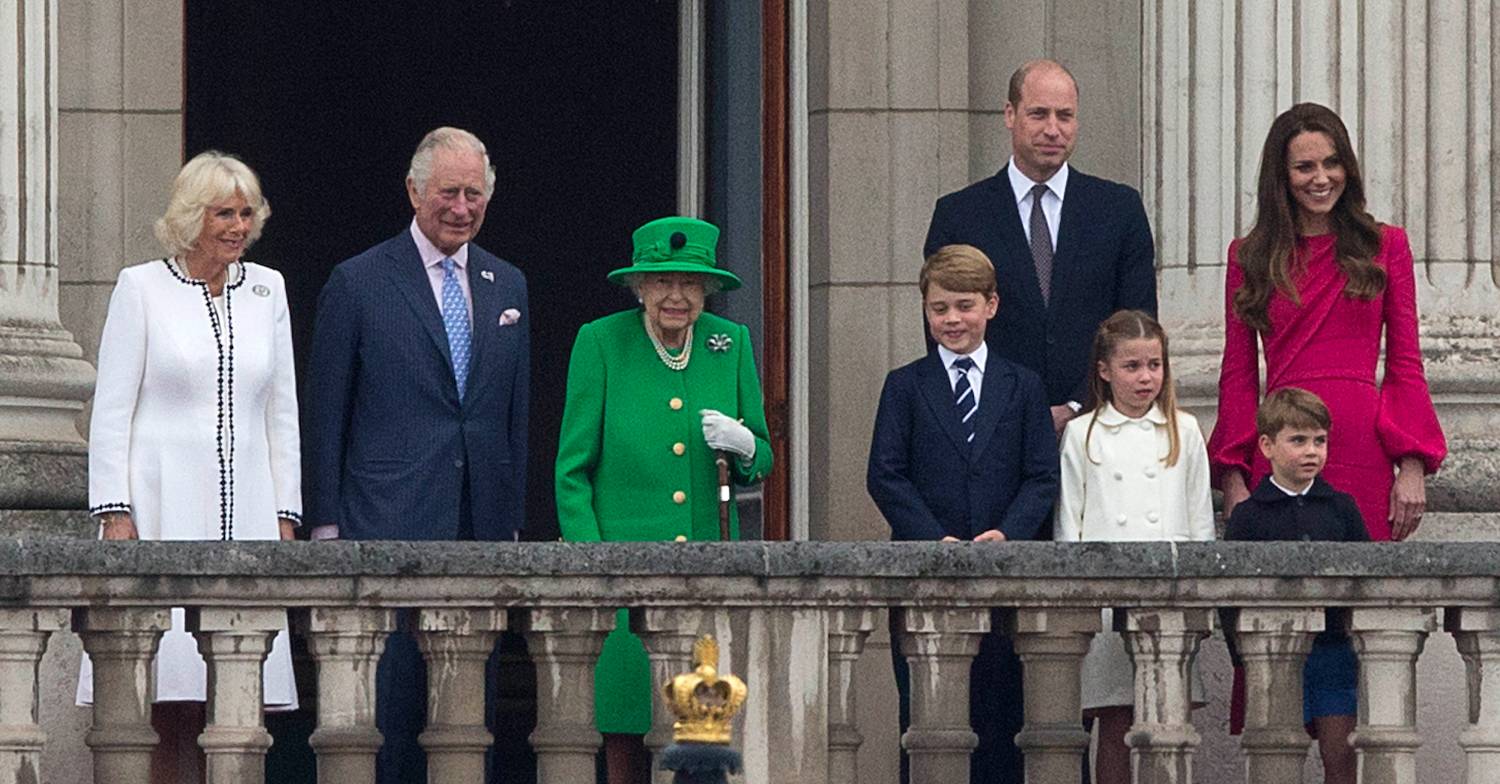 The Queen in green outfit on palace balcony with senior royals