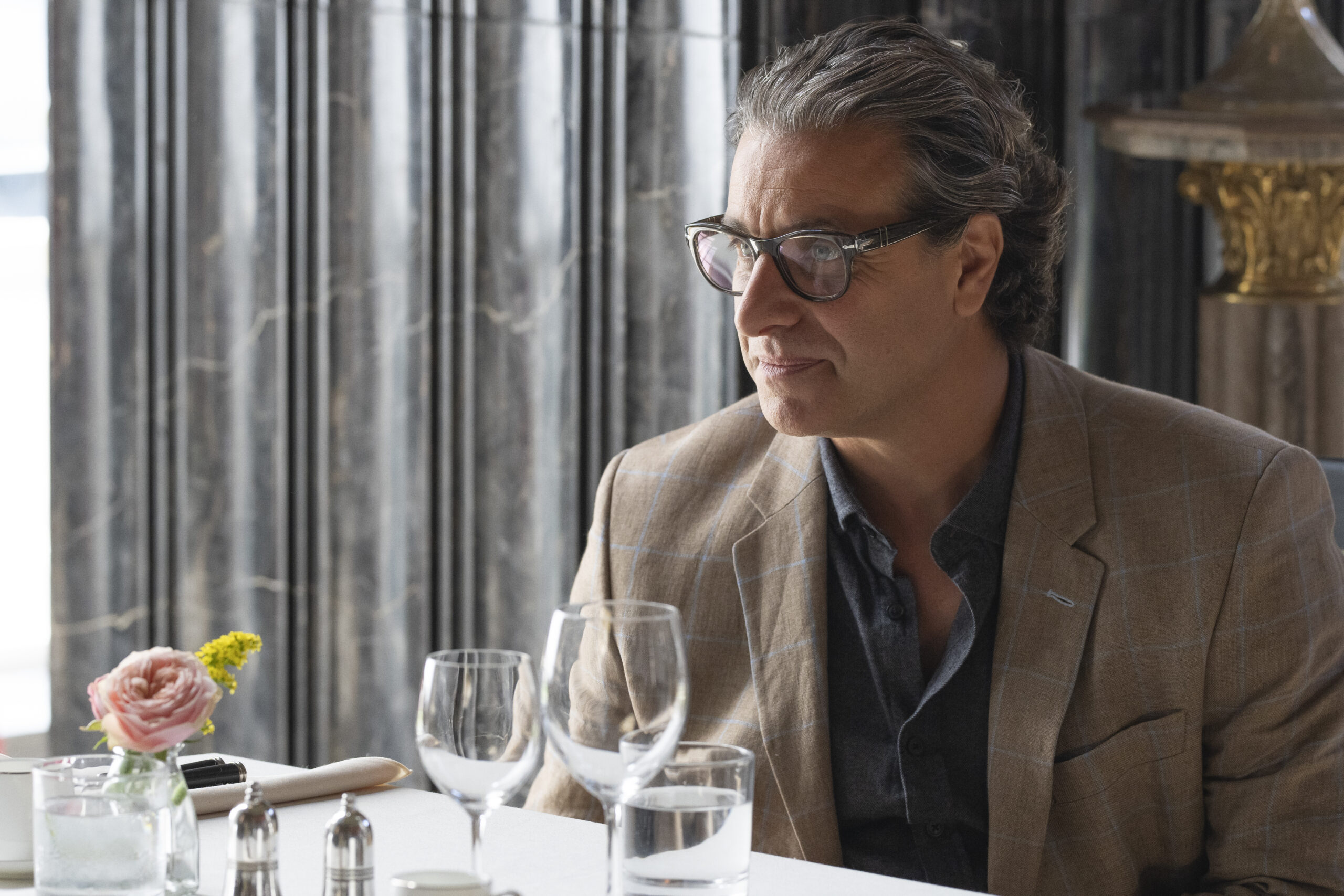 ADAM LEVY as Charles Hanani