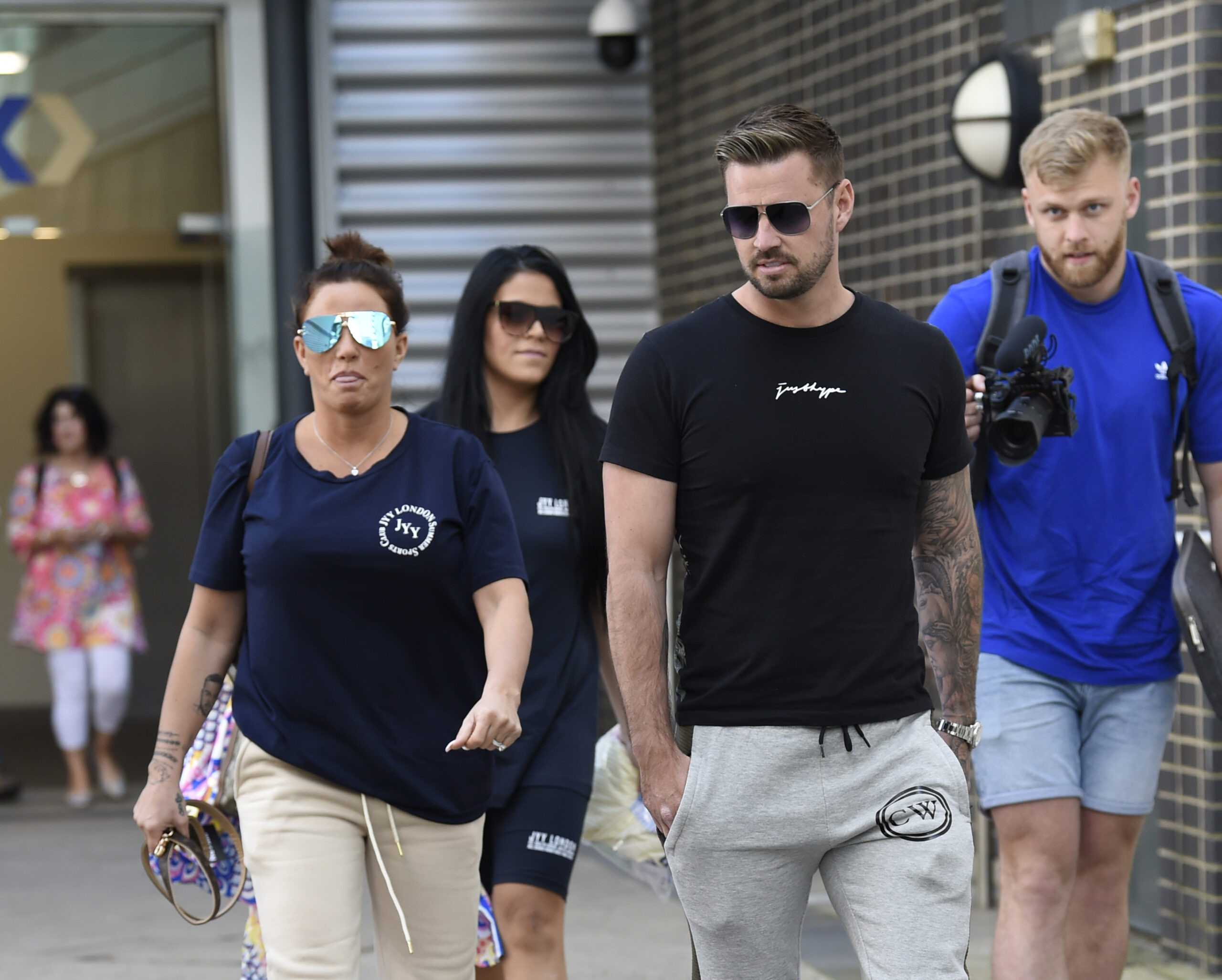 Katie Price and her fiance Carl Woods on a day out together