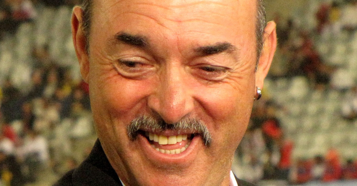 Liverpool football legend Bruce Grobbelaar smiling on TV