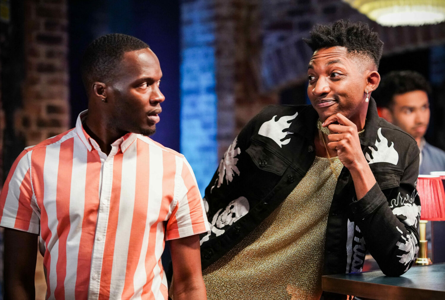 Felix and Finlay smile as they drink at Peggy's in EastEnders