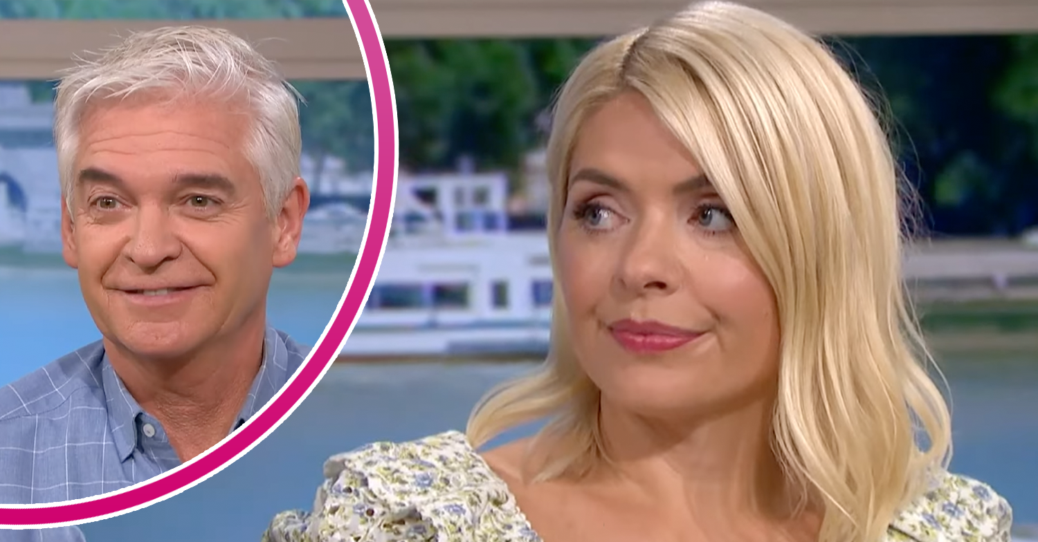 Holly Willoughby looking peeved and Phil smiling