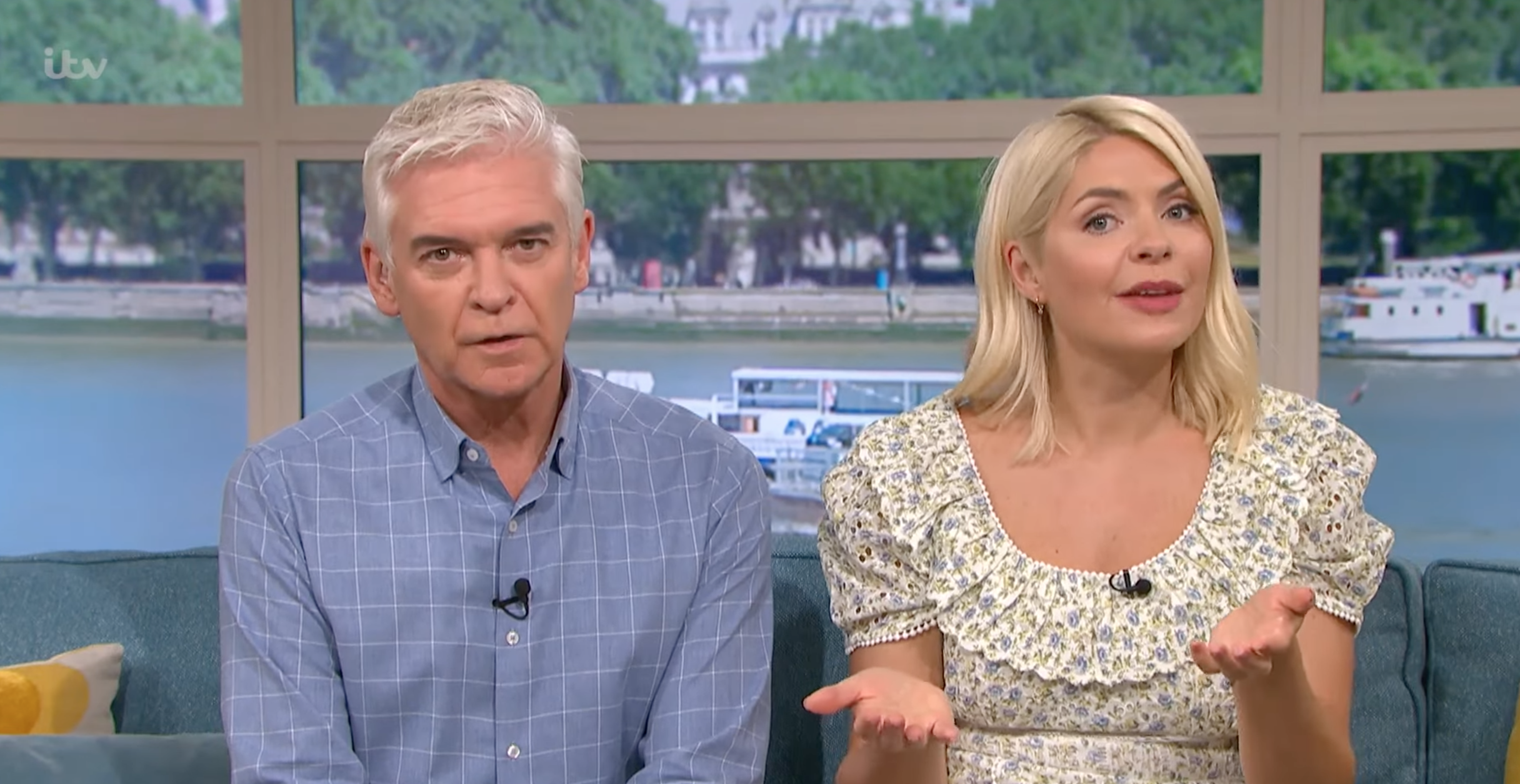 Holly Willoughby shrugging on This Morning and Phil looking cross