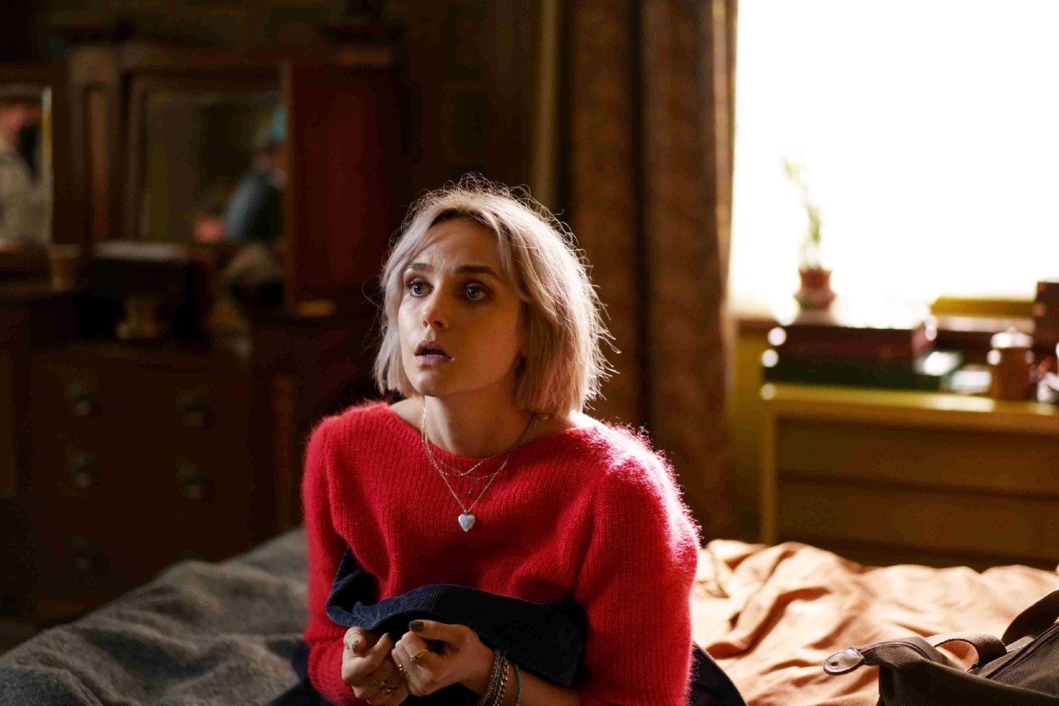 Joanna Vanderham in a pink jumper in The Control Room