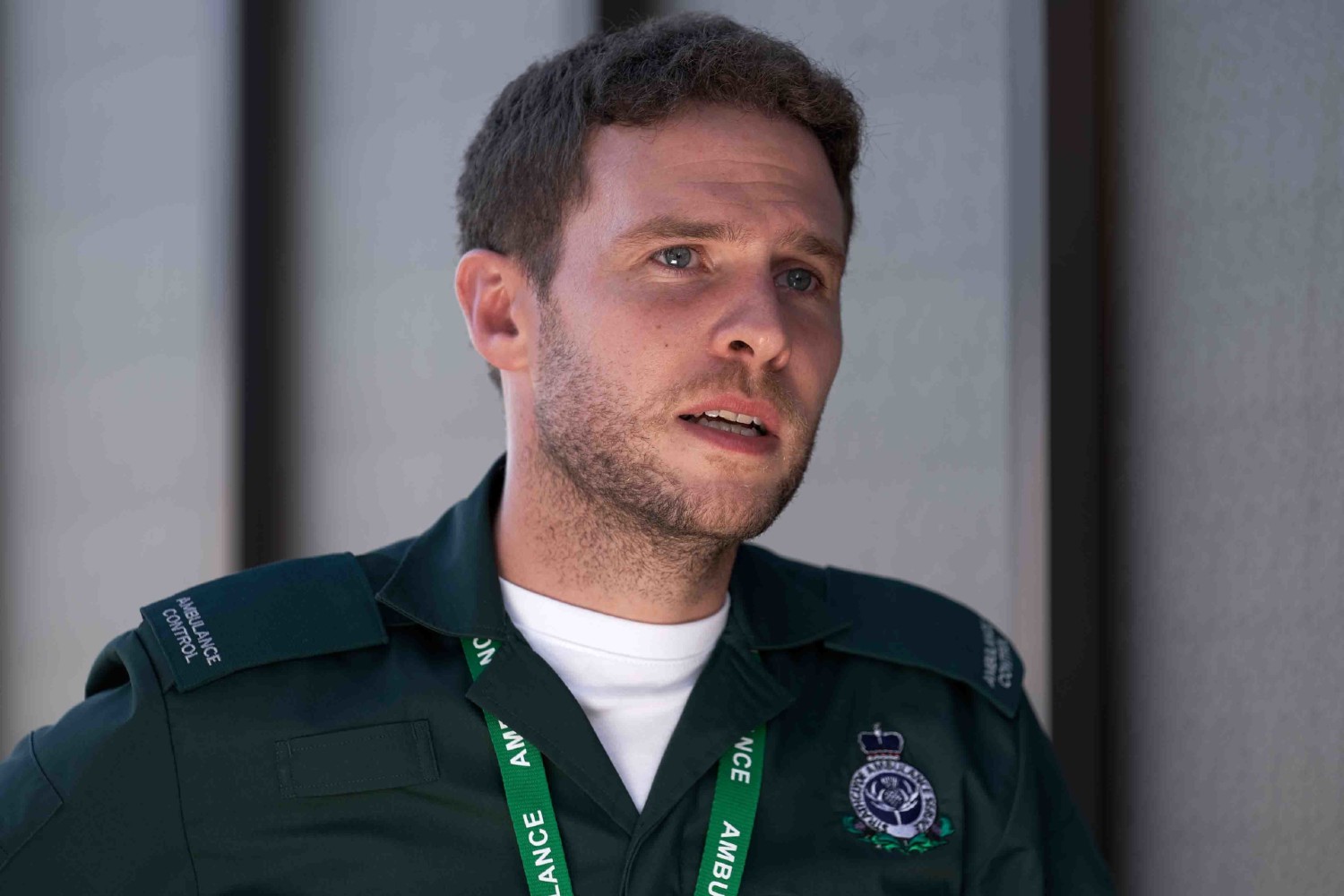 Iain De Caestecker looks concerned in The Control Room