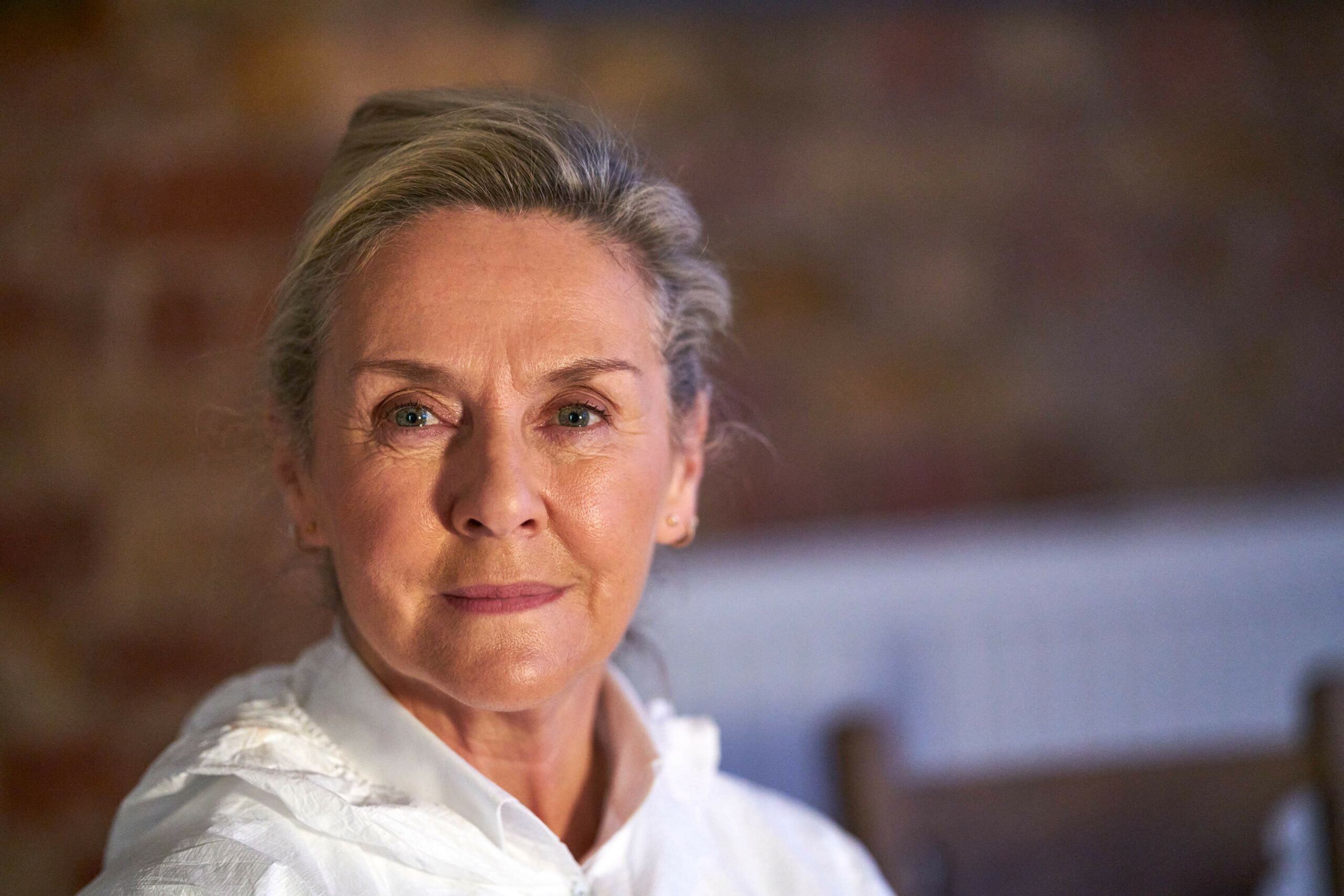 Amanda Burton in white overalls in Silent Witness