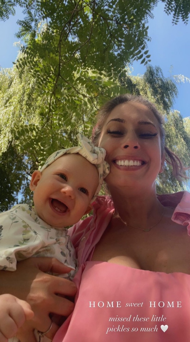 Stacey Solomon smiling with baby Rose