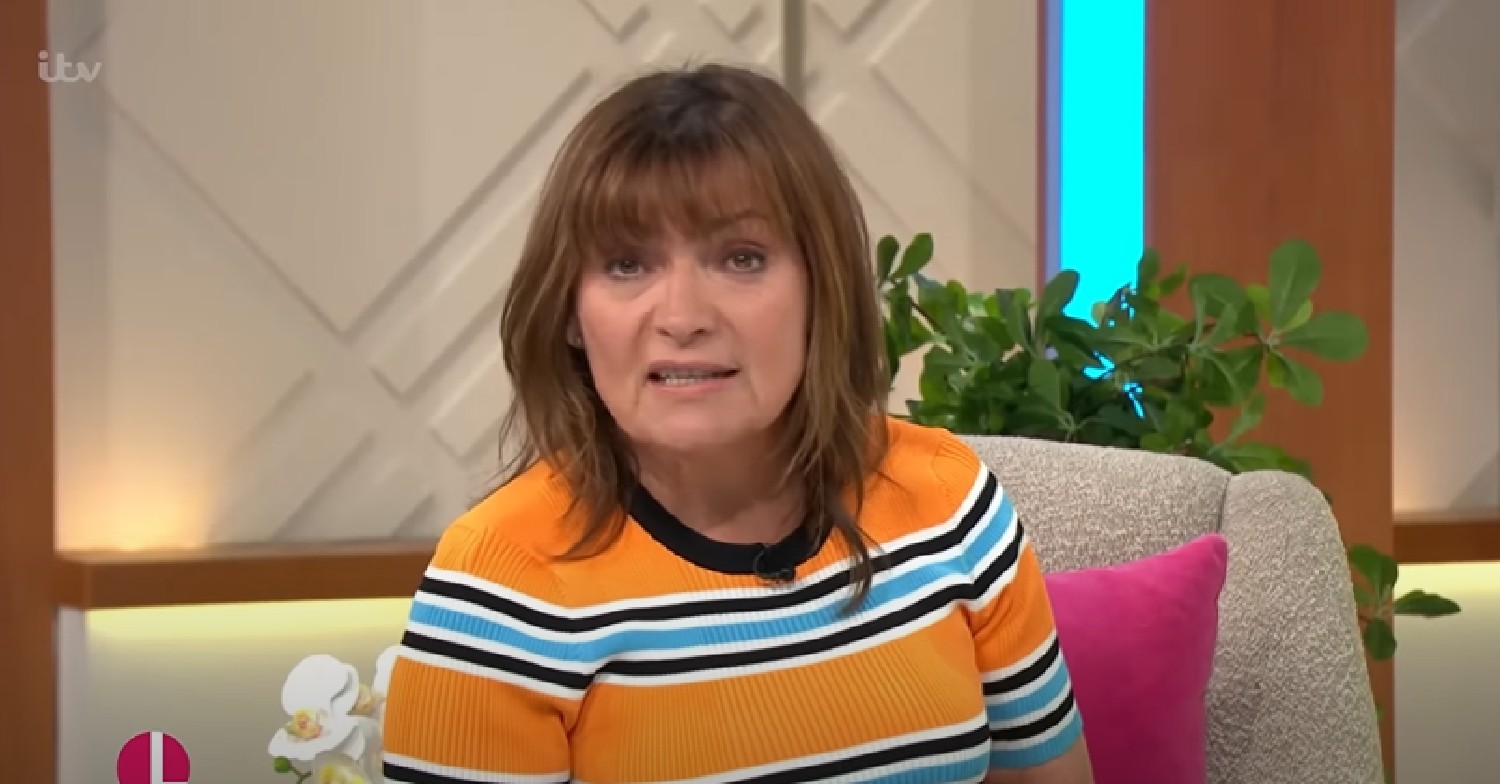 Lorraine Kelly in striped dress on her show Lorraine