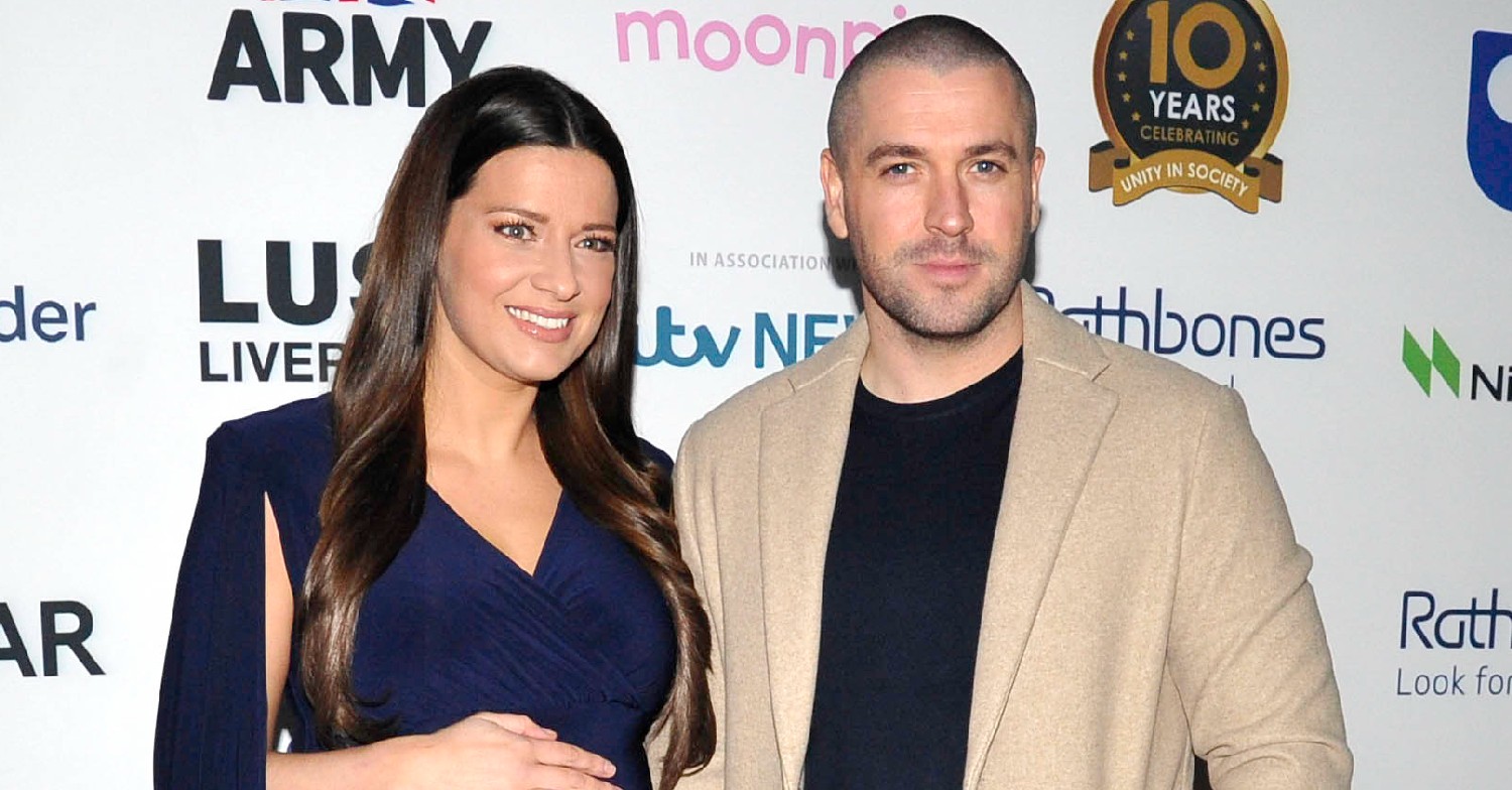 Shayne Ward and his wife, Sophie, smiling for camera