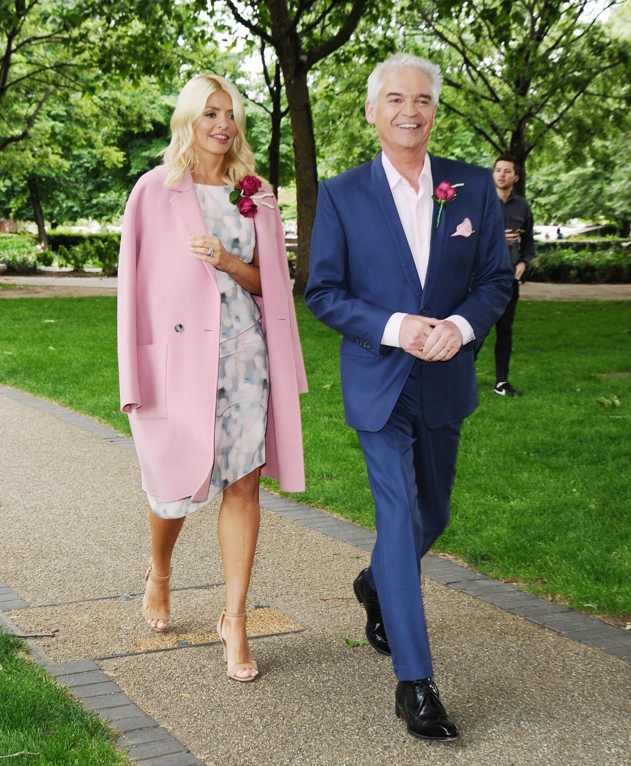Holly Willoughby and Phillip Schofield smile as they film for This Morning