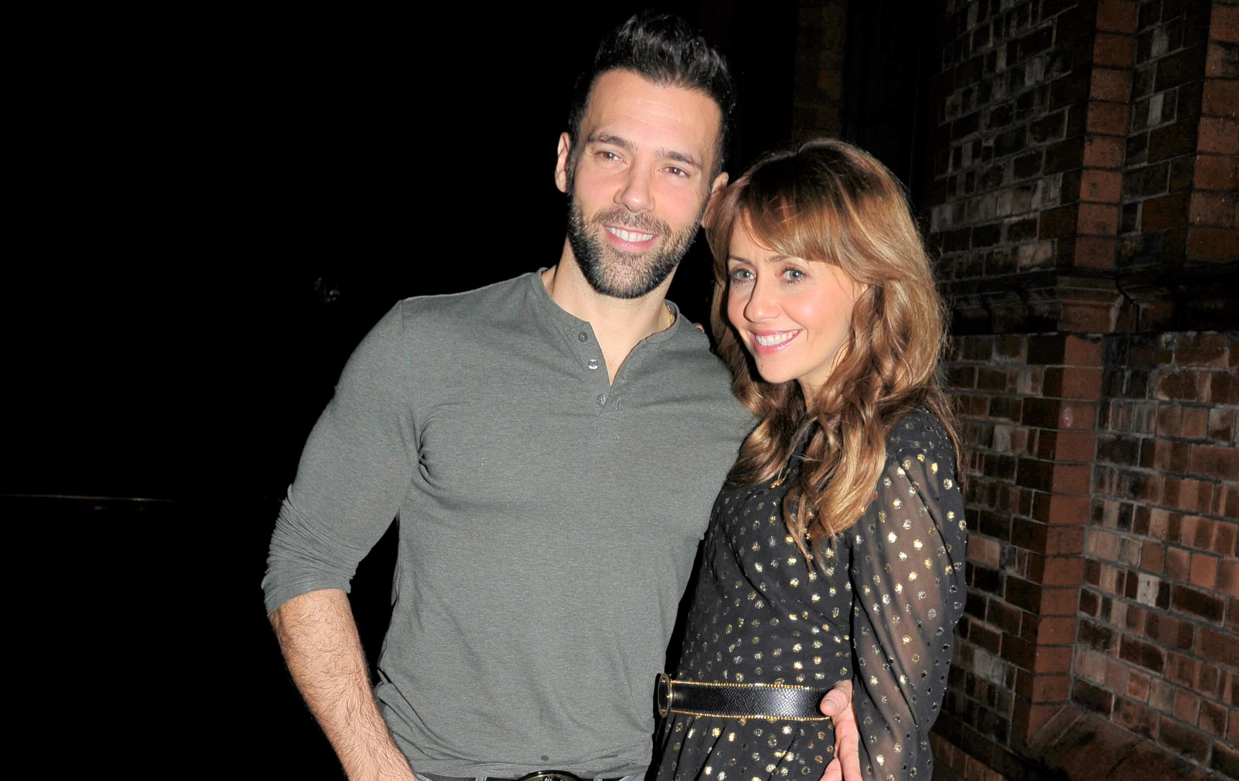 Sylvain Longchambon and wife Samia smile together