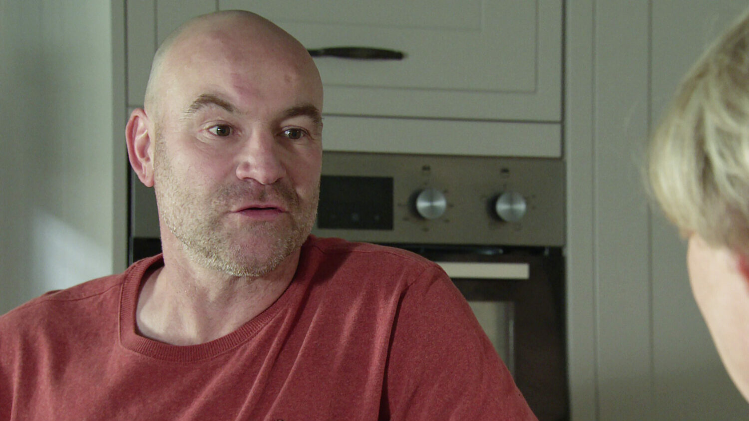 Tim Metcalfe explains something to wife Sally