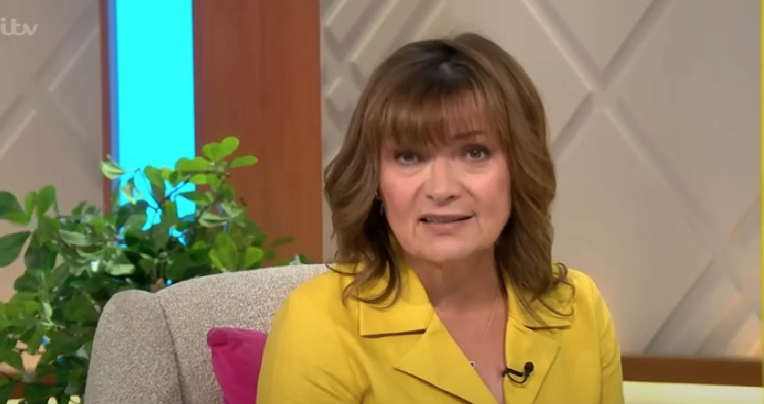 Lorraine Kelly presenting her show earring yellow