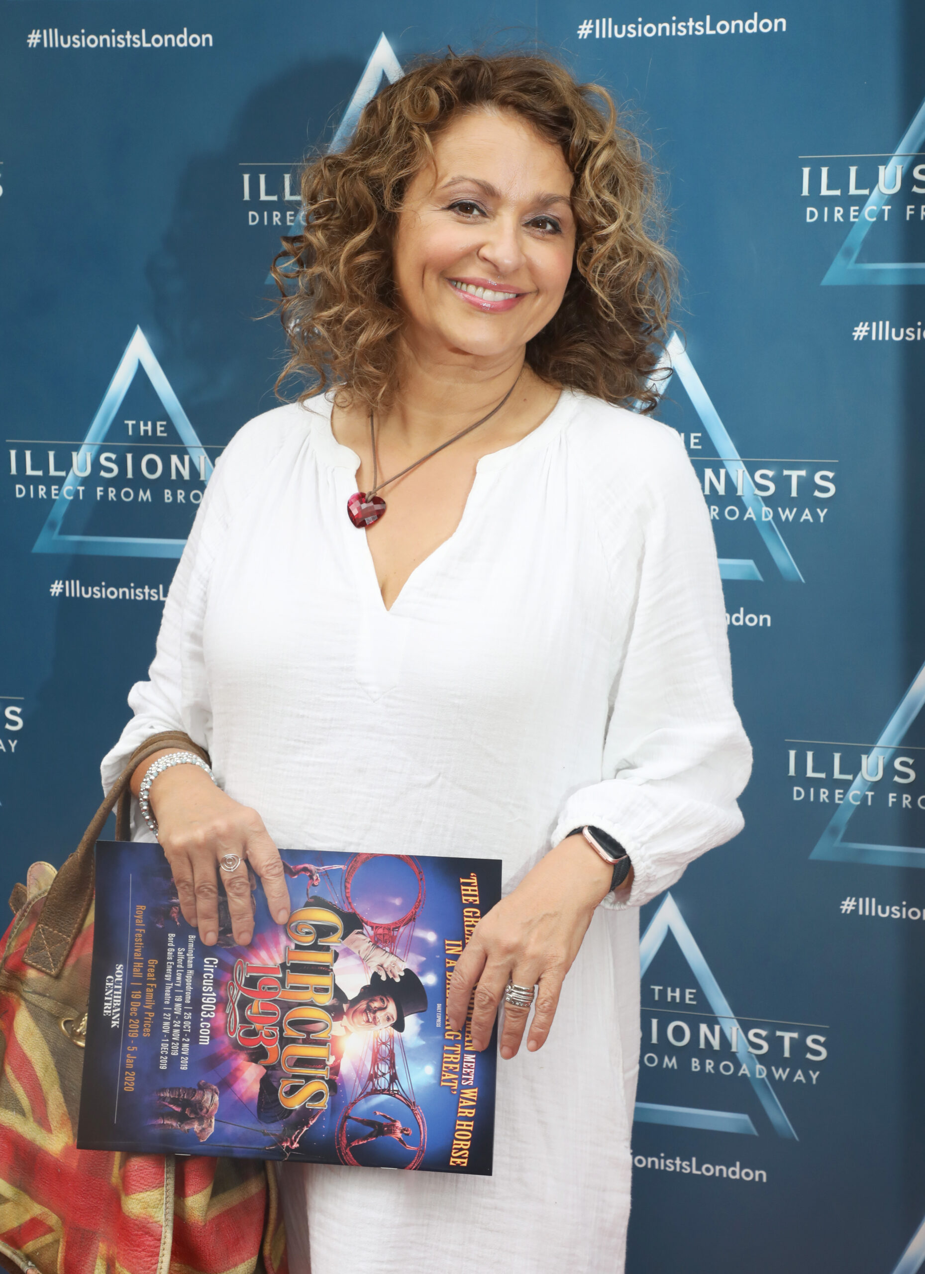 Nadia Sawalha smiles at The Illusionists - Gala Night