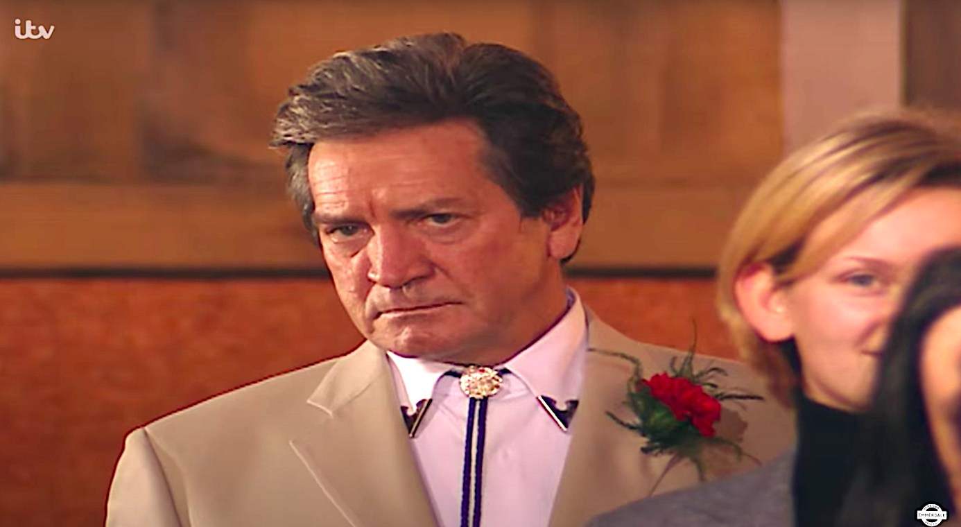 Rodney Blackstock glowers at Ashley and Bernice's wedding