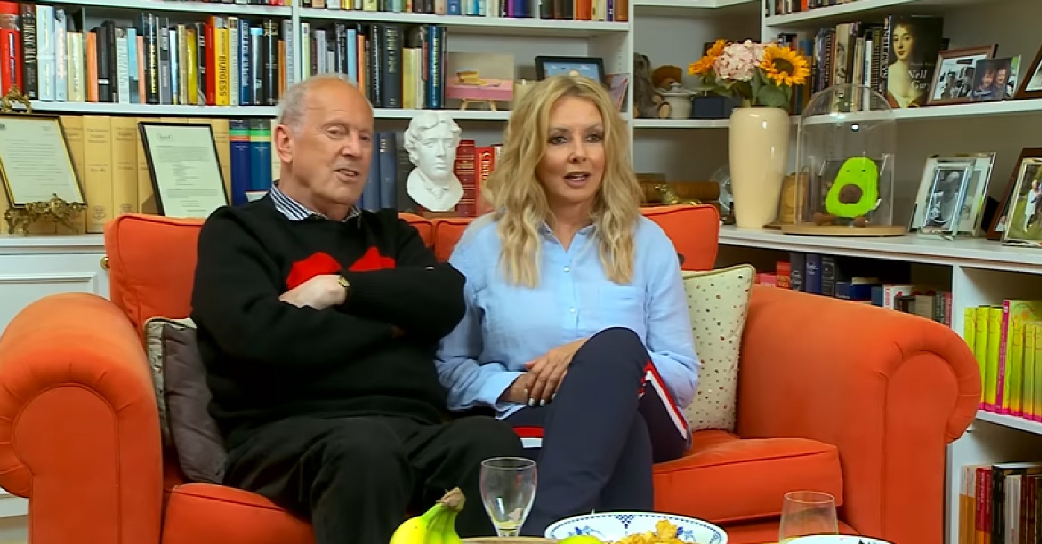 Gyles Brandreth and Carol Vorderman watching the TV on Celebrity Gogglebox