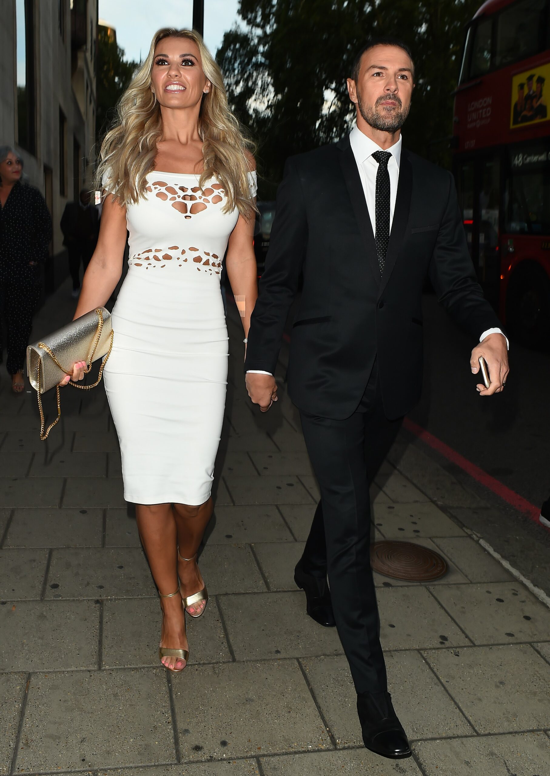 Paddy McGuinness and wife Christine walk hand in hand on night out