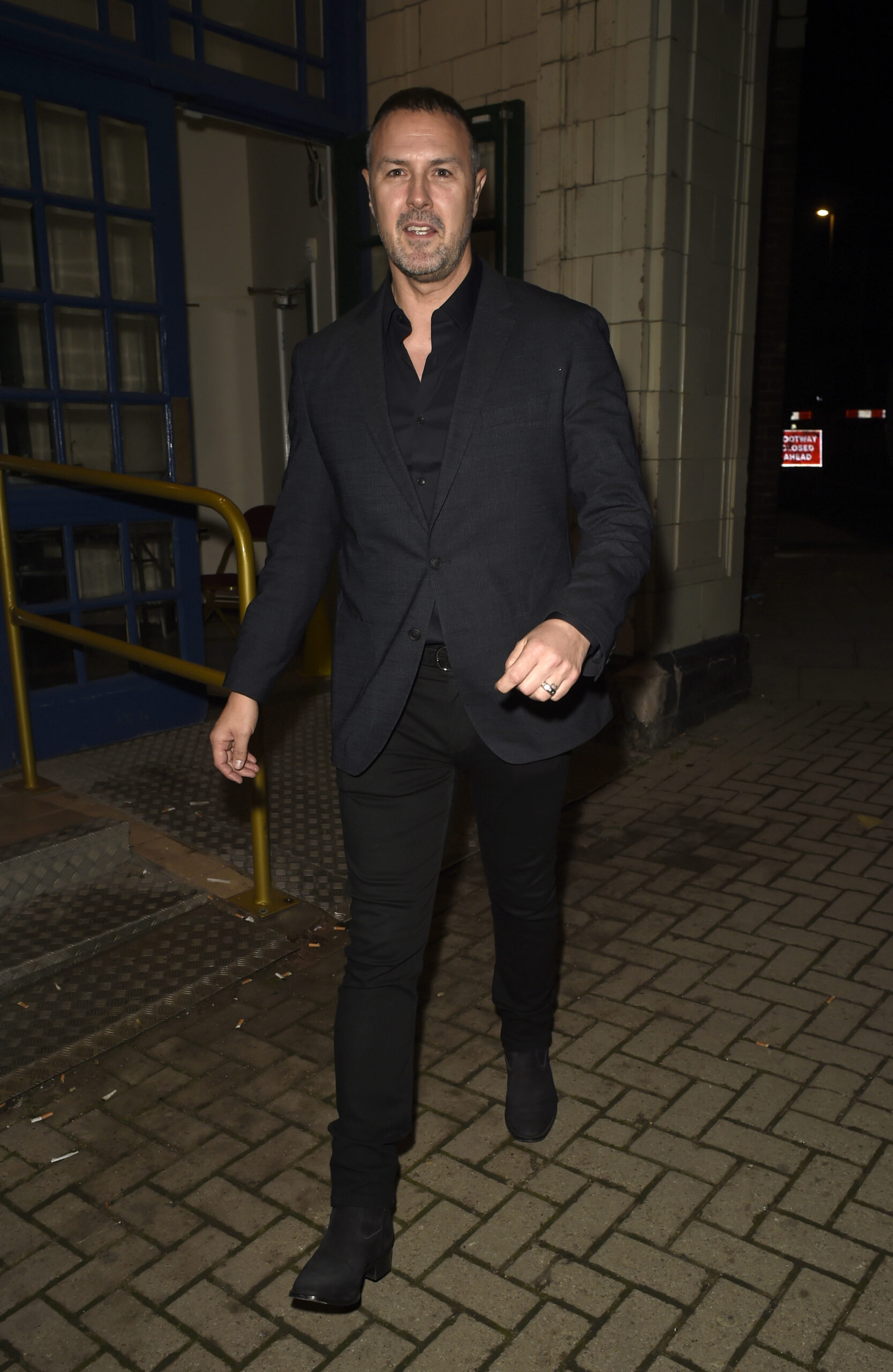 Paddy McGuinness wearing a black suit