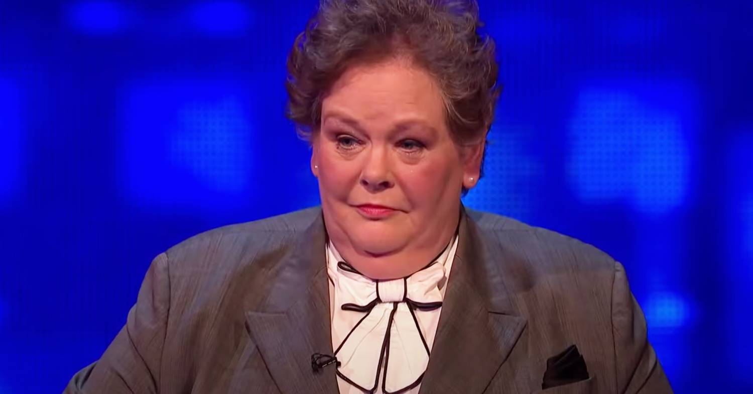 Anne Hegerty as The Governess in her job on The Chase glares at a quiz opponent