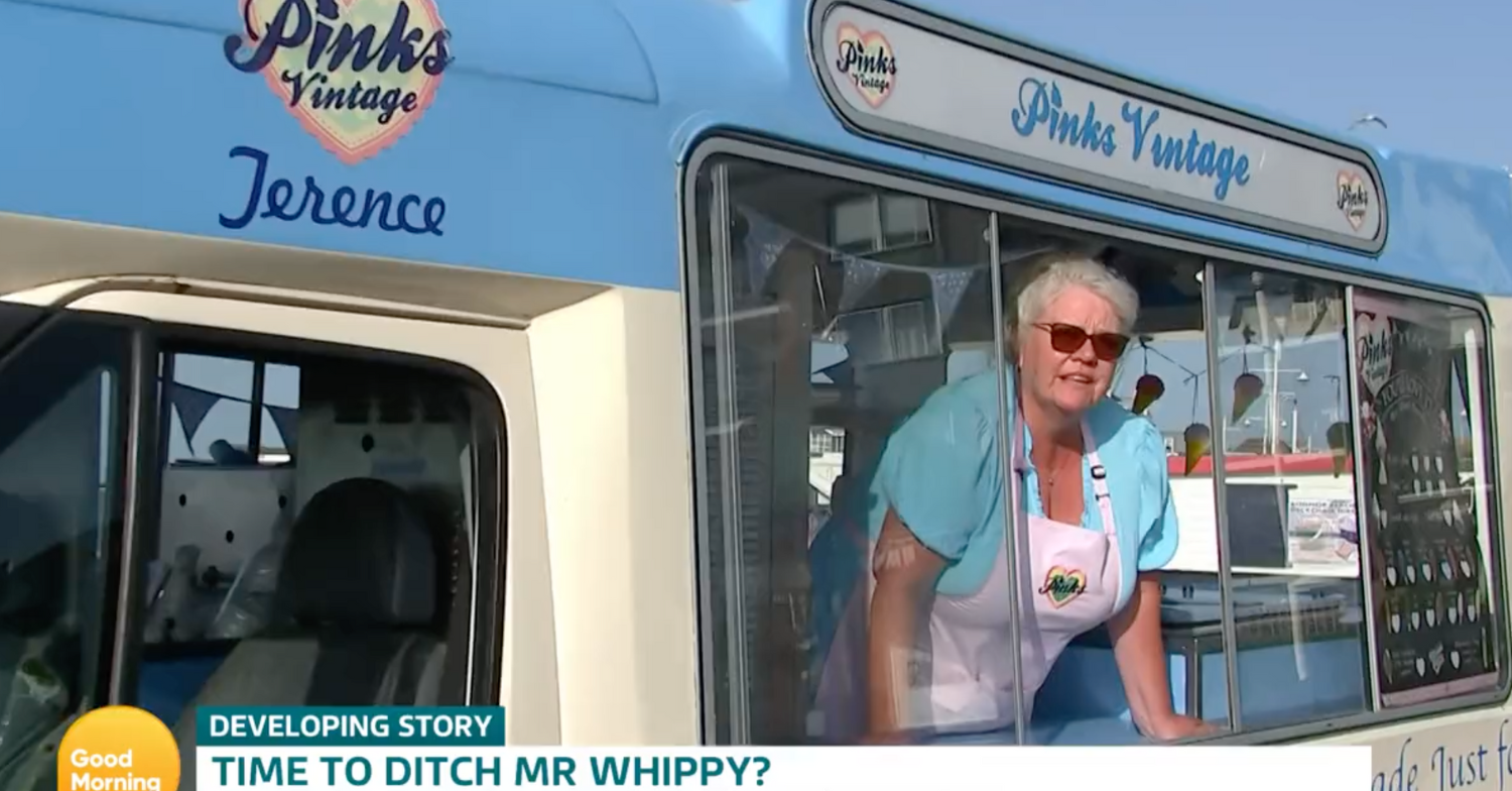 Woman sticks head out of ice cream van