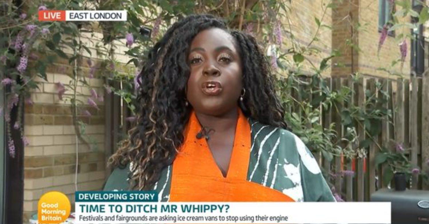 Journalist Afua Hagan wearing orange