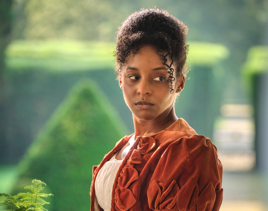 Crystal Clarke as Miss Lambe in Sanditon, posing for her portrait by Sanditon's local artist