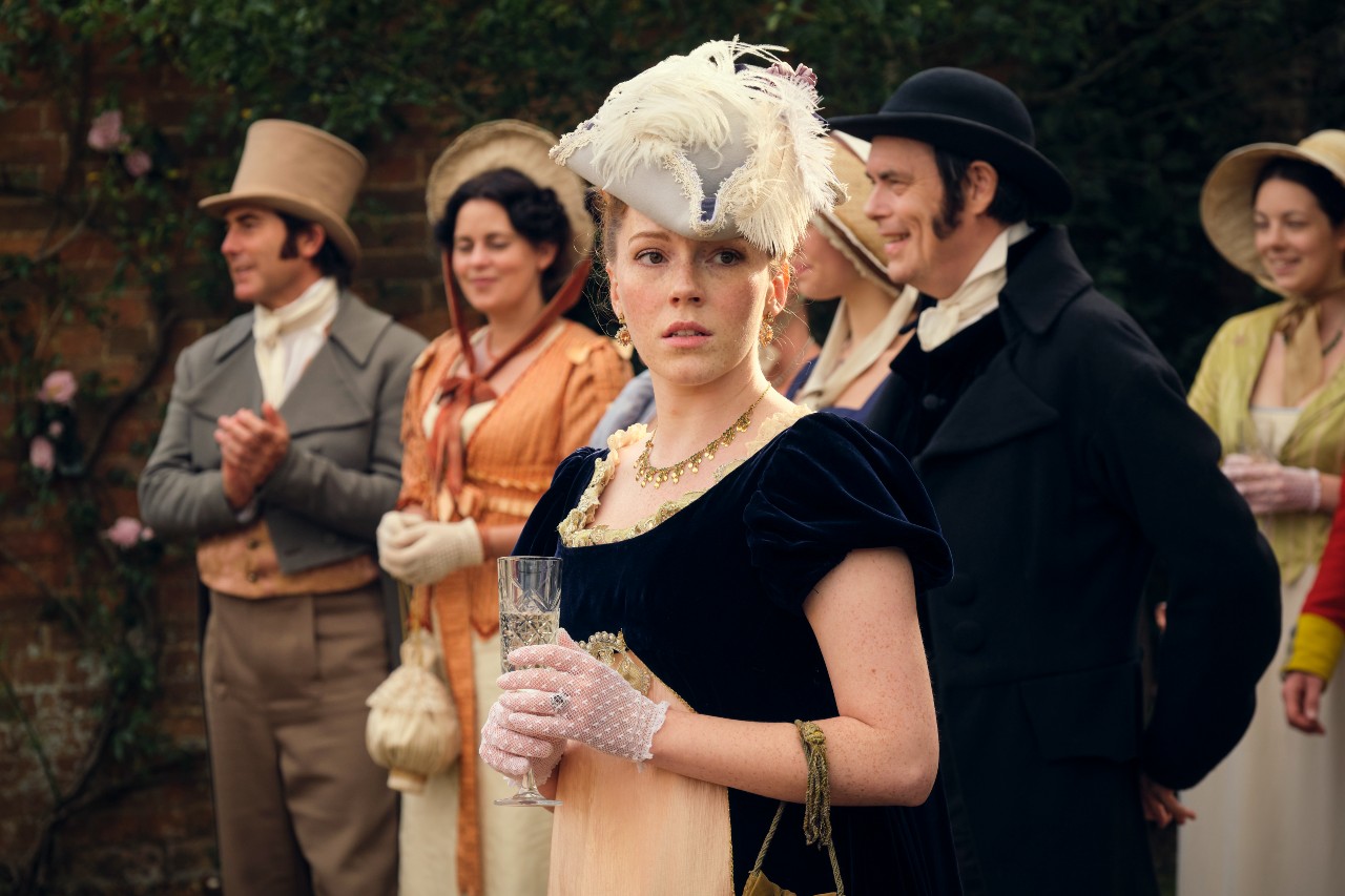 Charlotte Spencer as Esther Denham, attending a party in series 2 of Sanditon