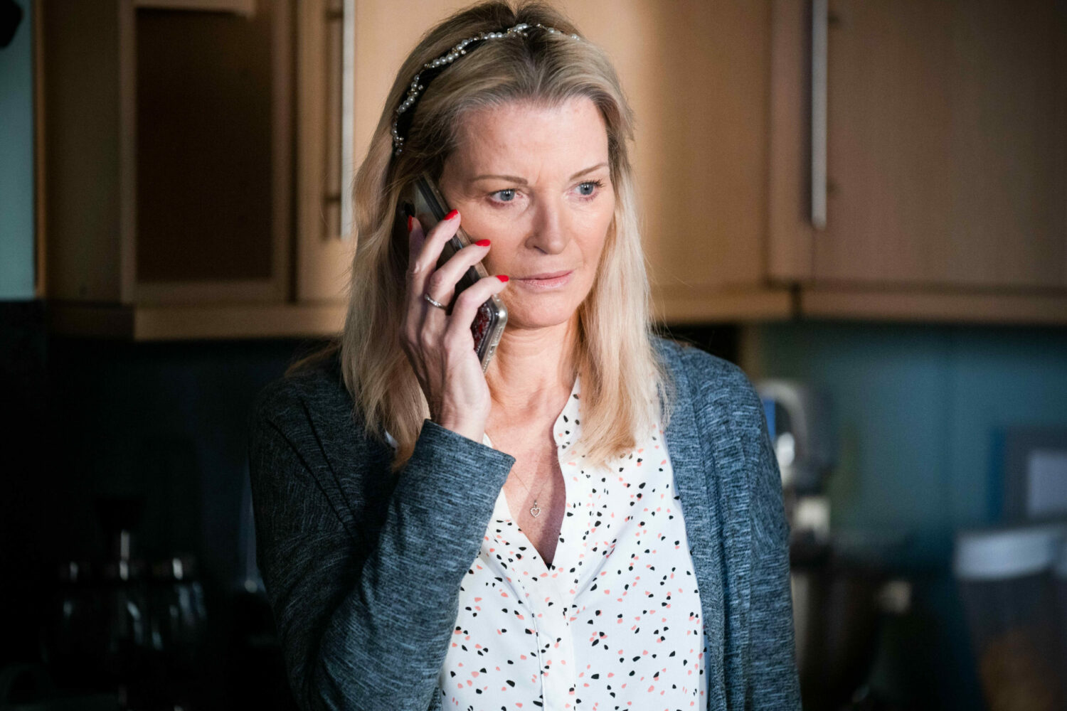 Kathy Beale makes a worried phone call