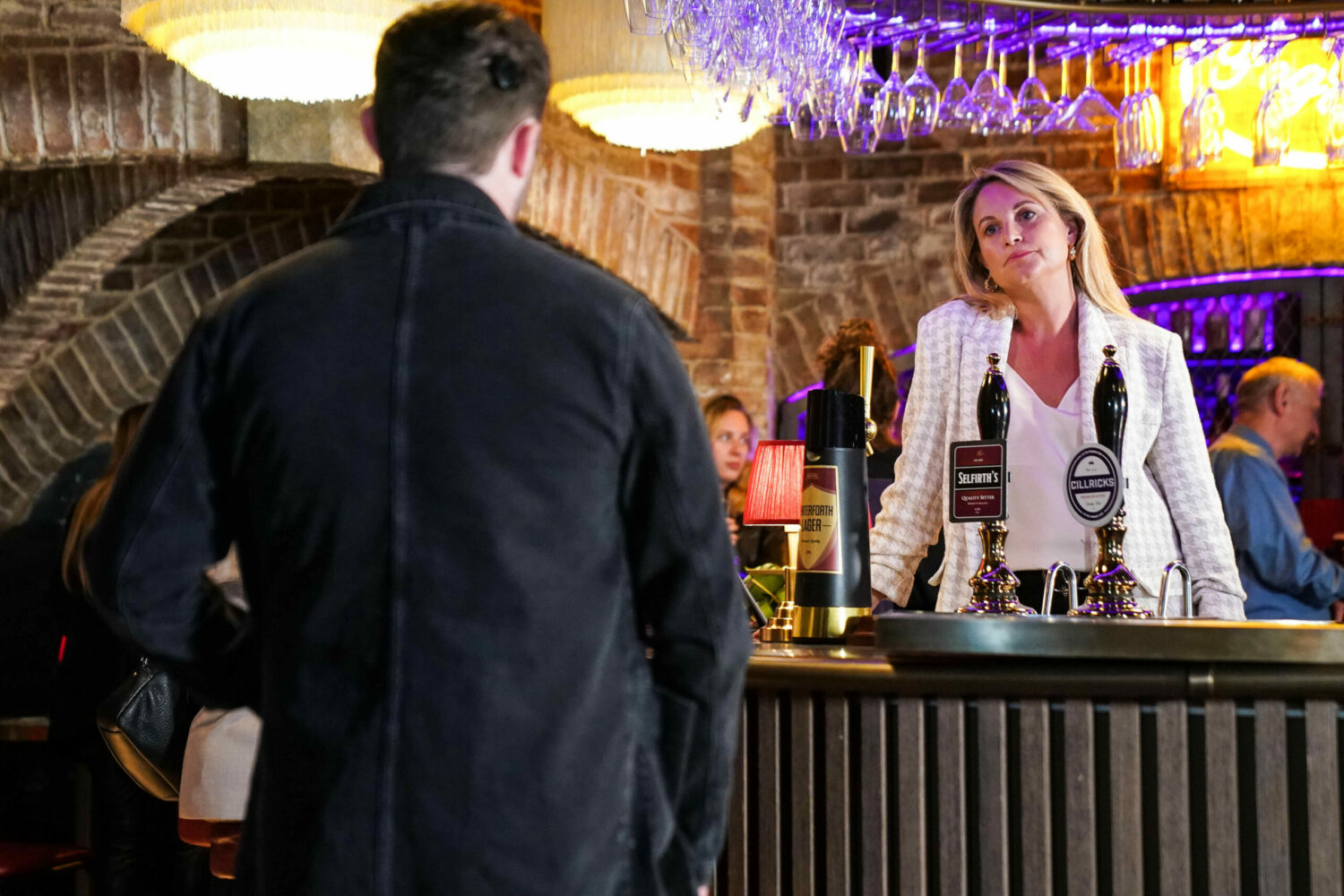 Sam Mitchell looks at Ben with concern