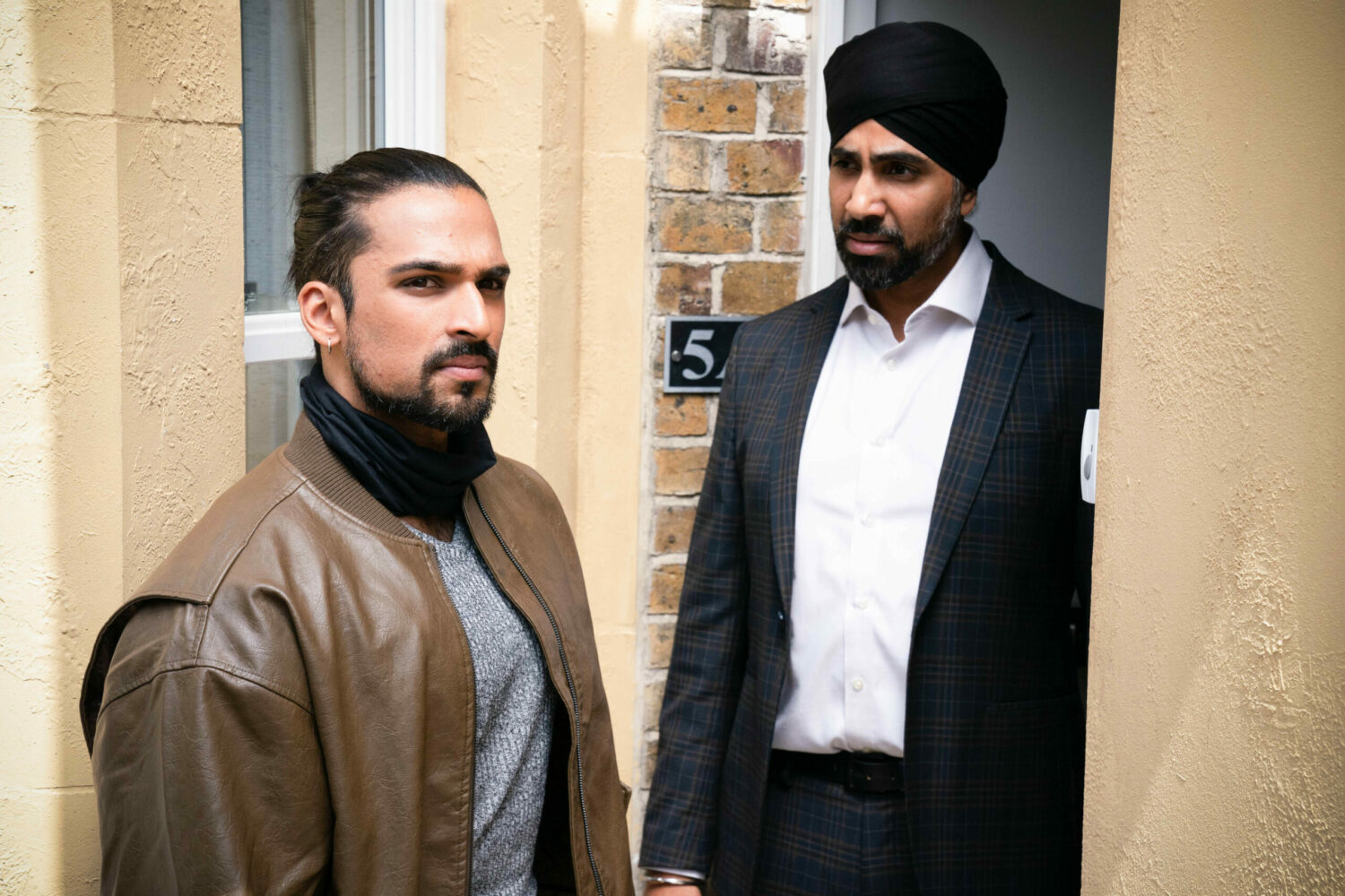 EastEnders Ravi looks serious as Kheerat doesn't look happy