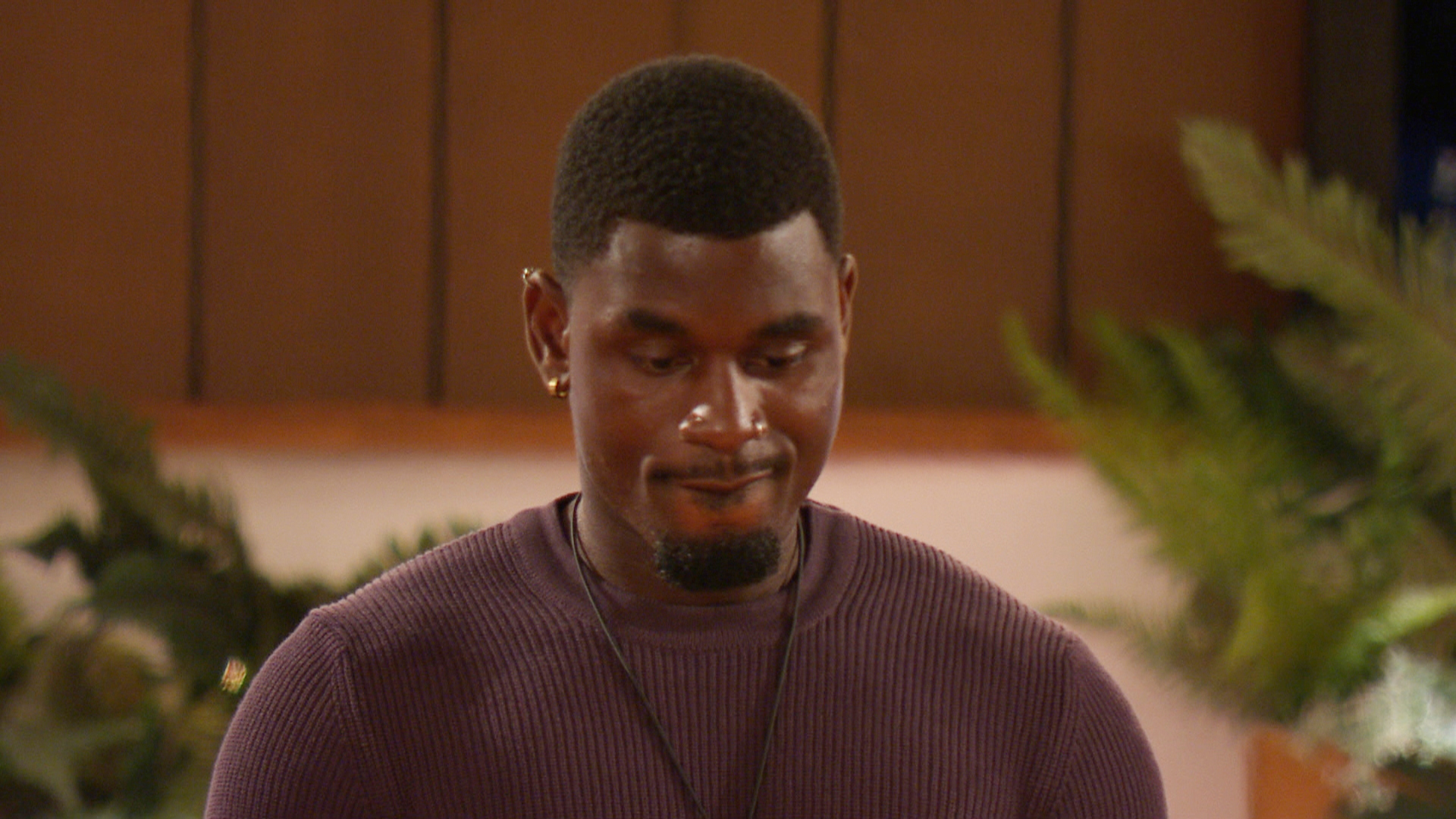 Dami looking sheepish on Love Island