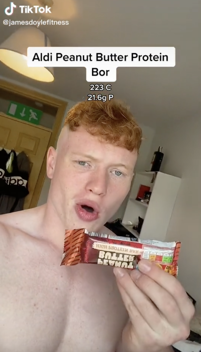 A man holding a Protein Bor on Tiktok