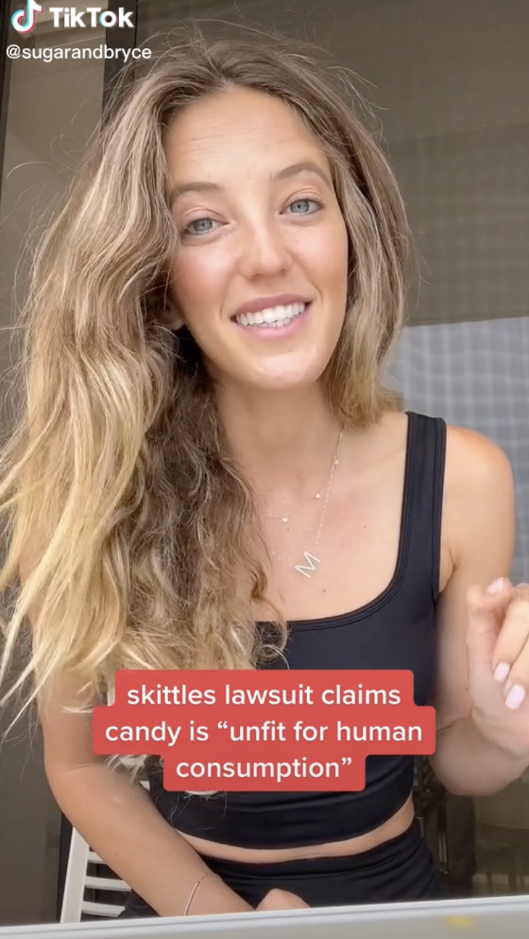 A TikTok user talking about the Skittles lawsuit