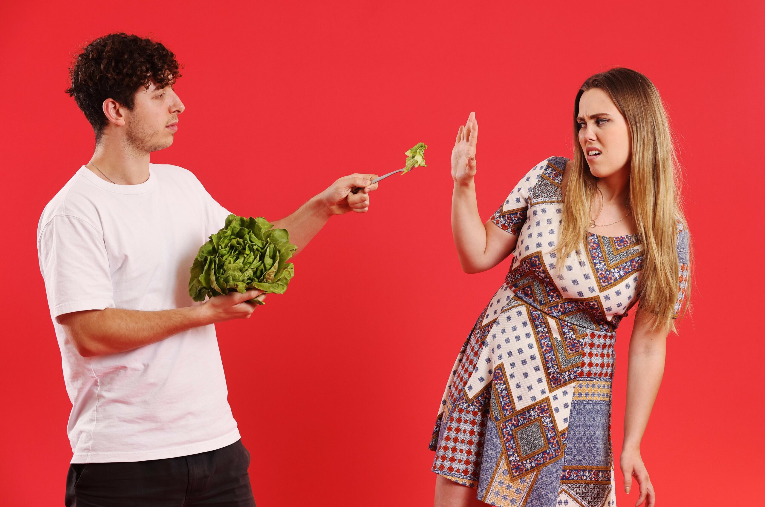 Sex and relationship expert Alix Fox screws up face at vegetables