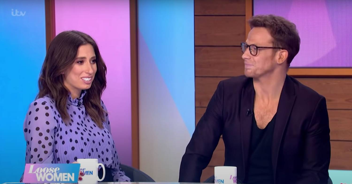 Stacey Solomon and Joe Swash sit with one another