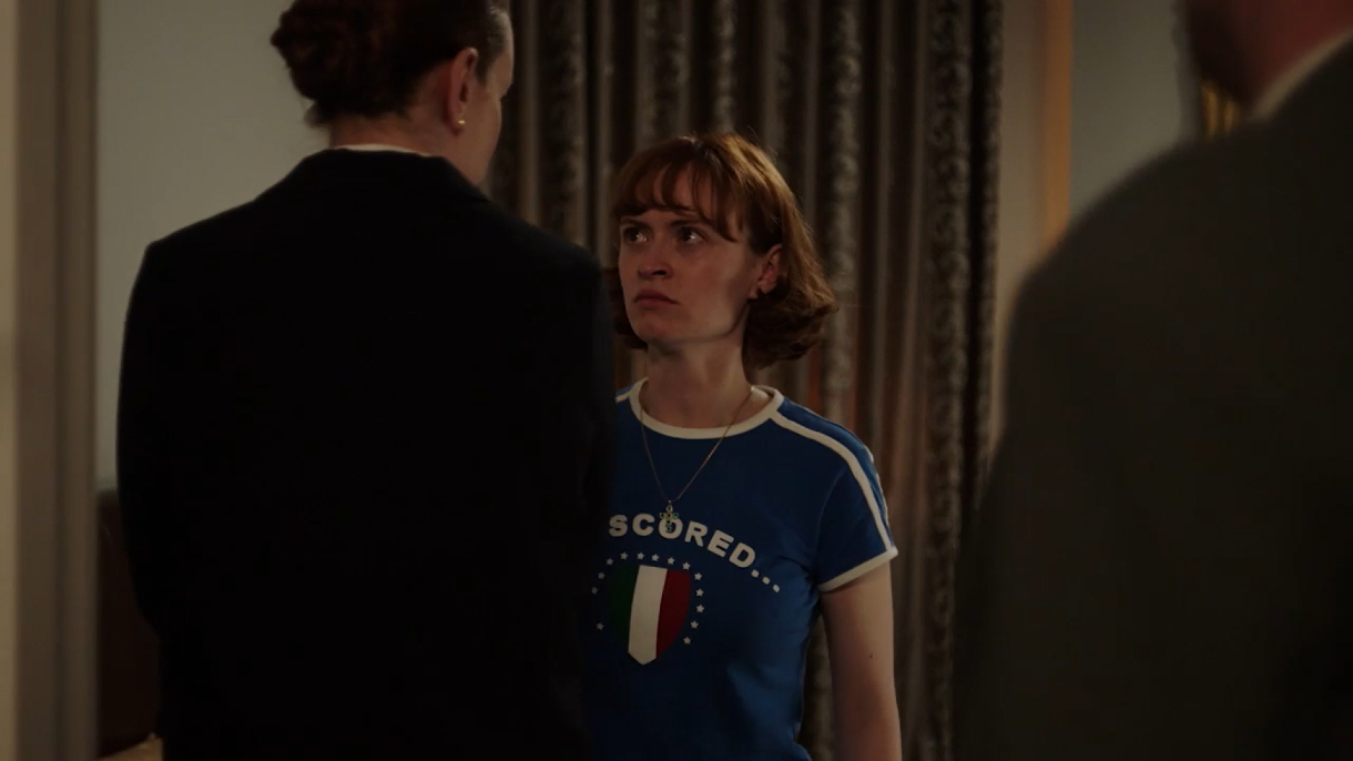 Jemma Carlton as Maxine Carr questioned by police in a football top