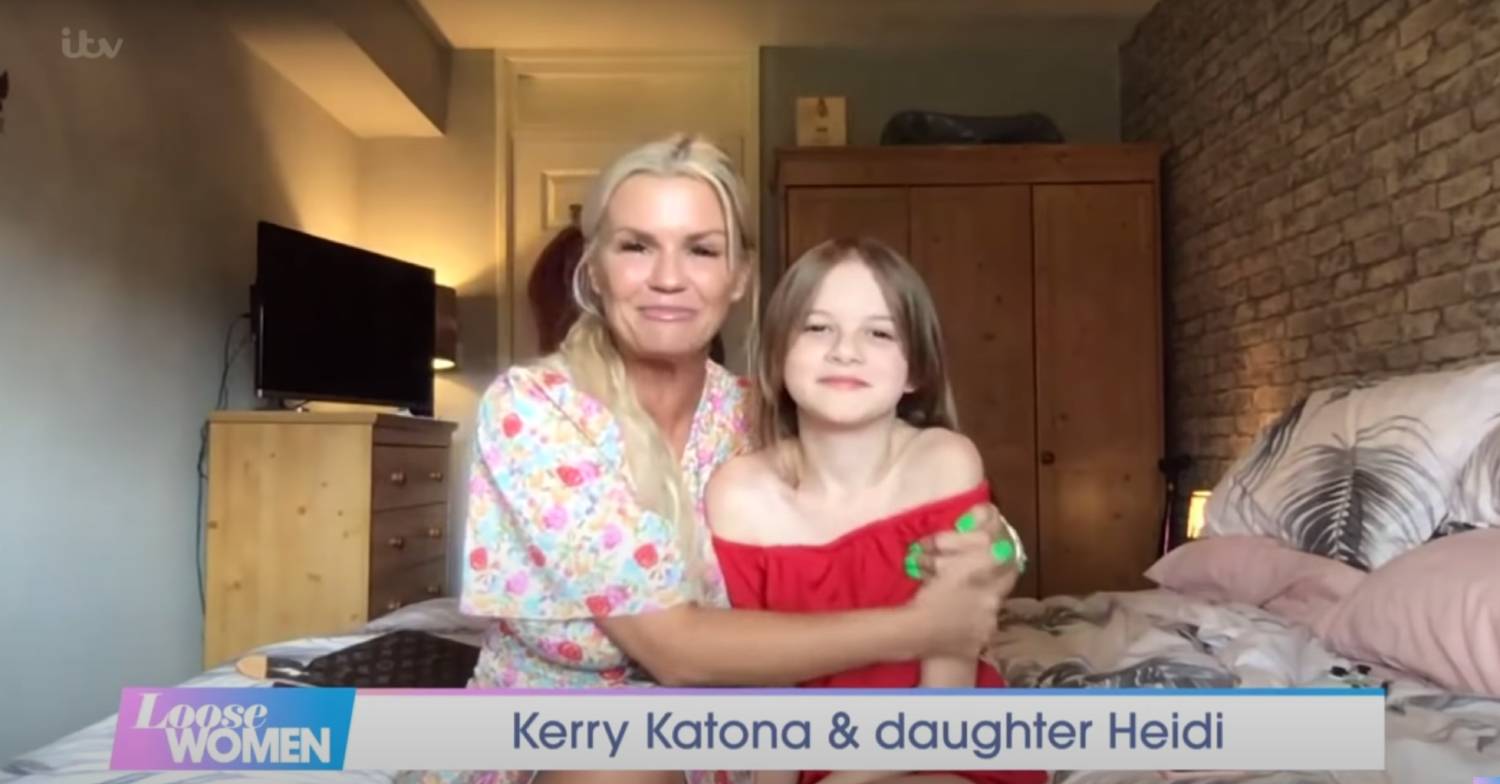 Kerry Katona hugs her daughter Heidi