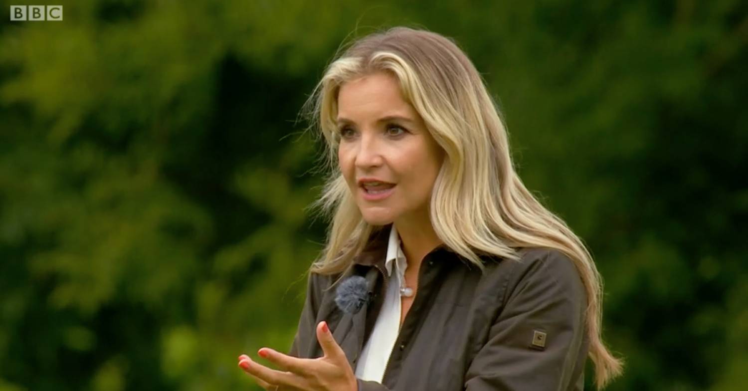 Helen Skelton asks a question and holds out her hand