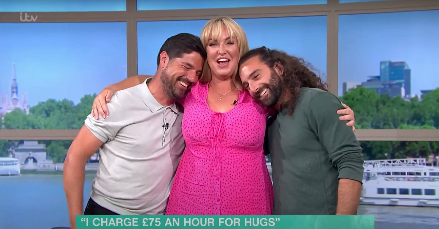 This Morning host Josie Gibson hugs Craig Doyle and a pro cuddler
