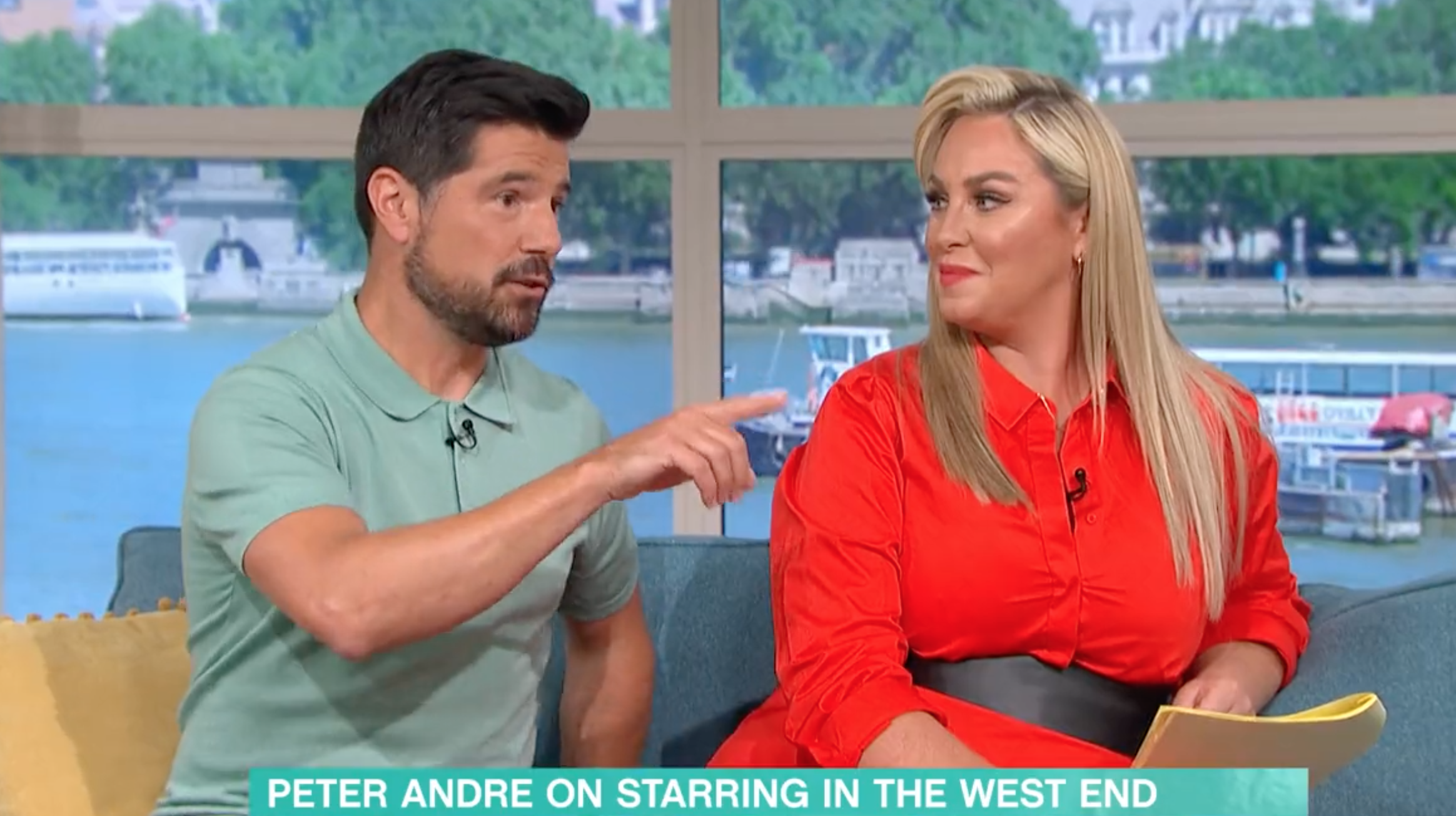 Craig Doyle points at Peter Andre as Josie looks on