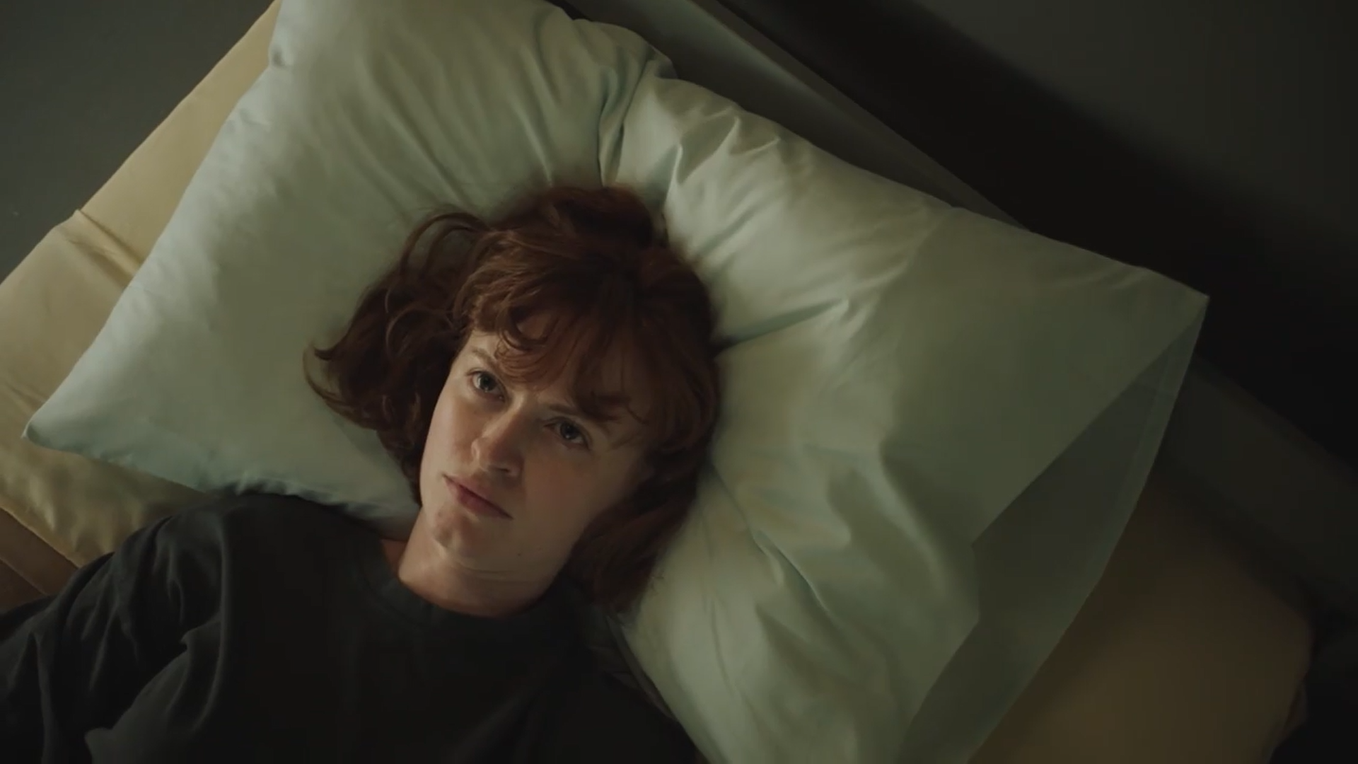 Jemma Carlton as Maxine Carr lying on a bed