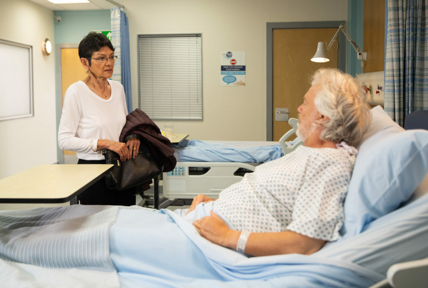 Corrie Stu is surprised to see Yasmeen visit him in hospital