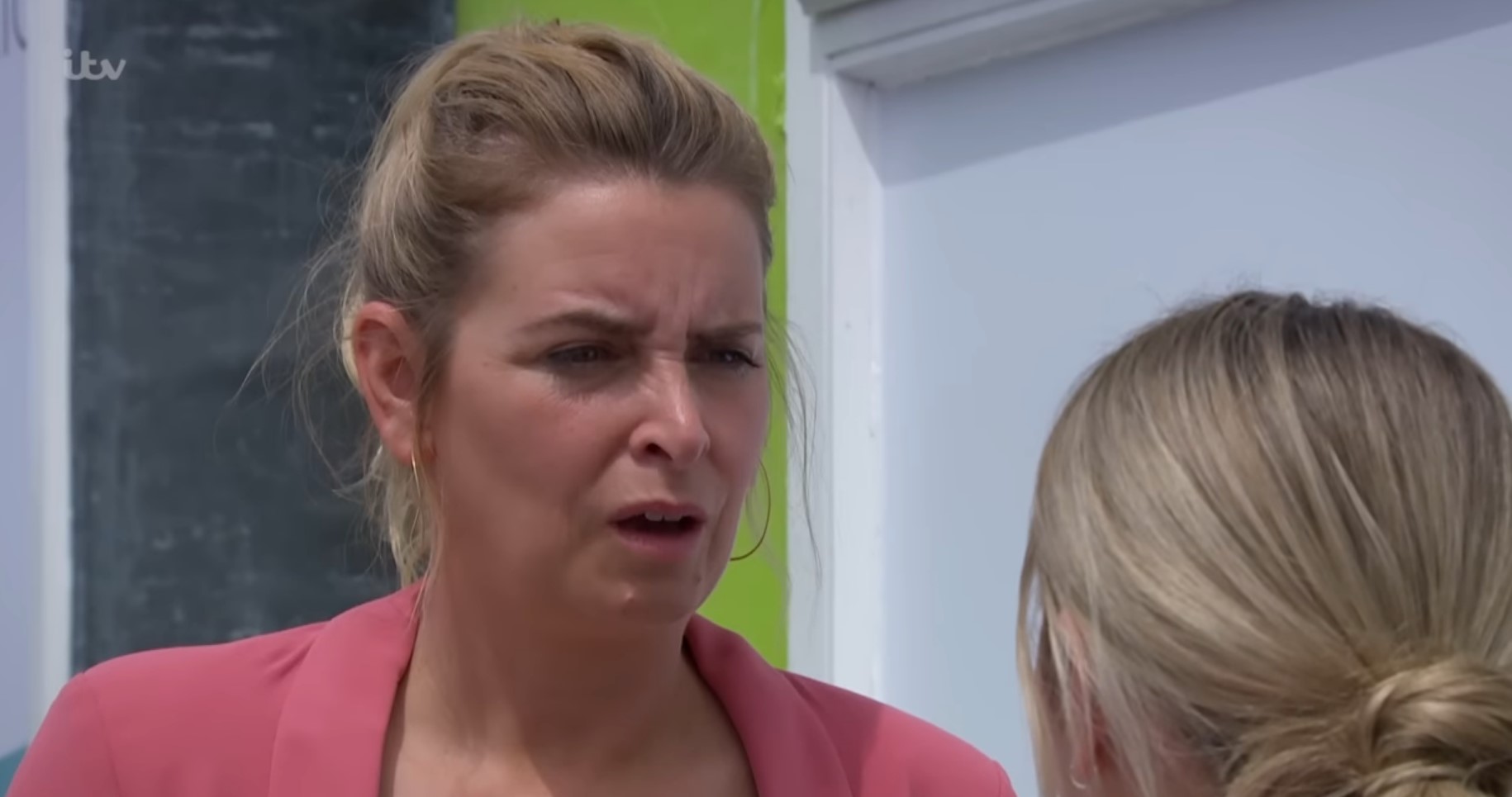 Emmerdale Charity looks angry with Amelia outside the abortion clinic
