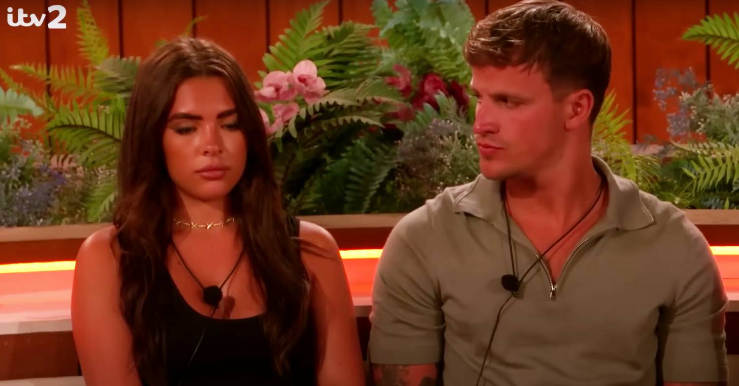 Luca Bish looks at a glum-looking Gemma Owen