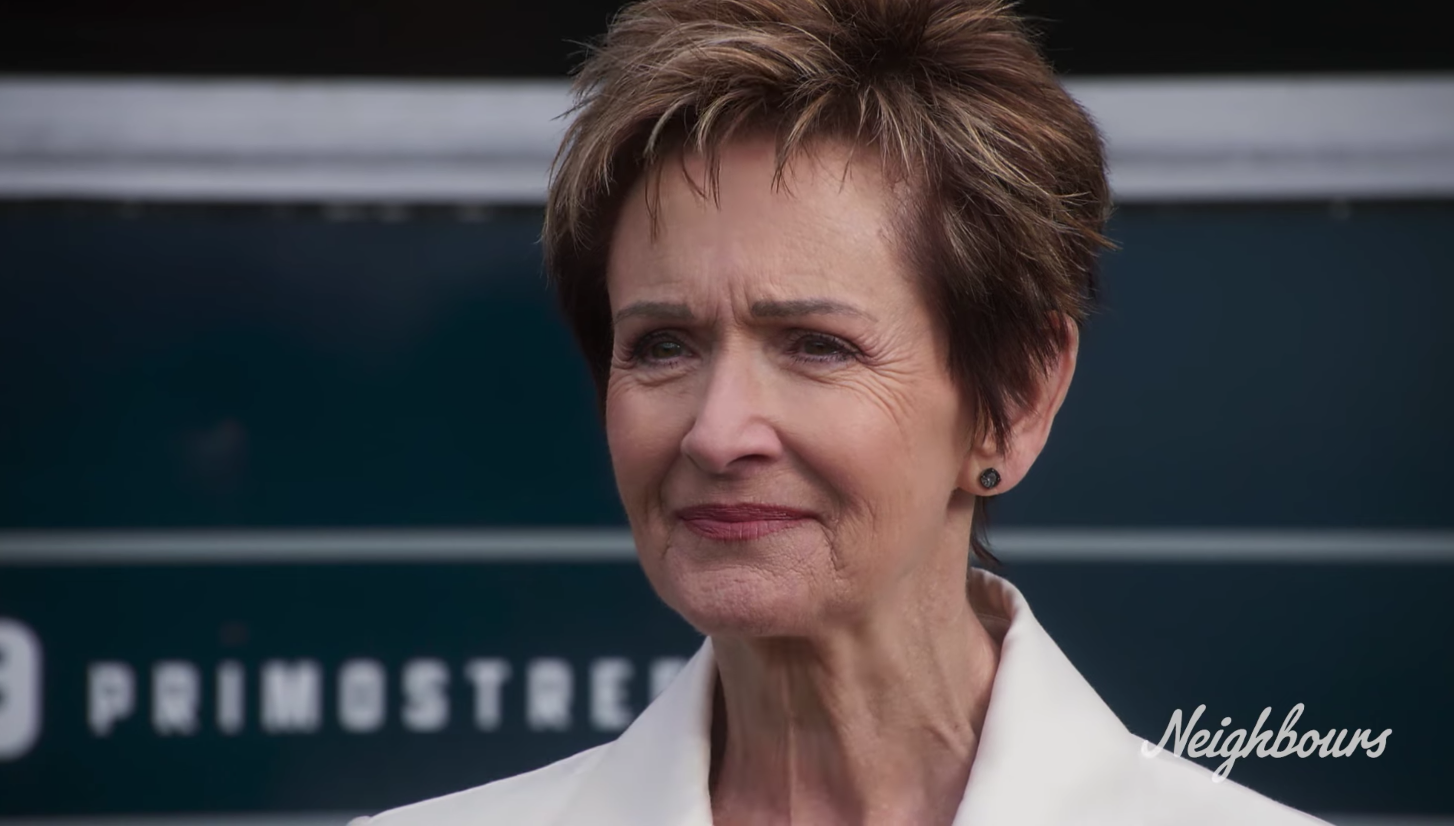 Susan Kennedy looking happy in Neighbours