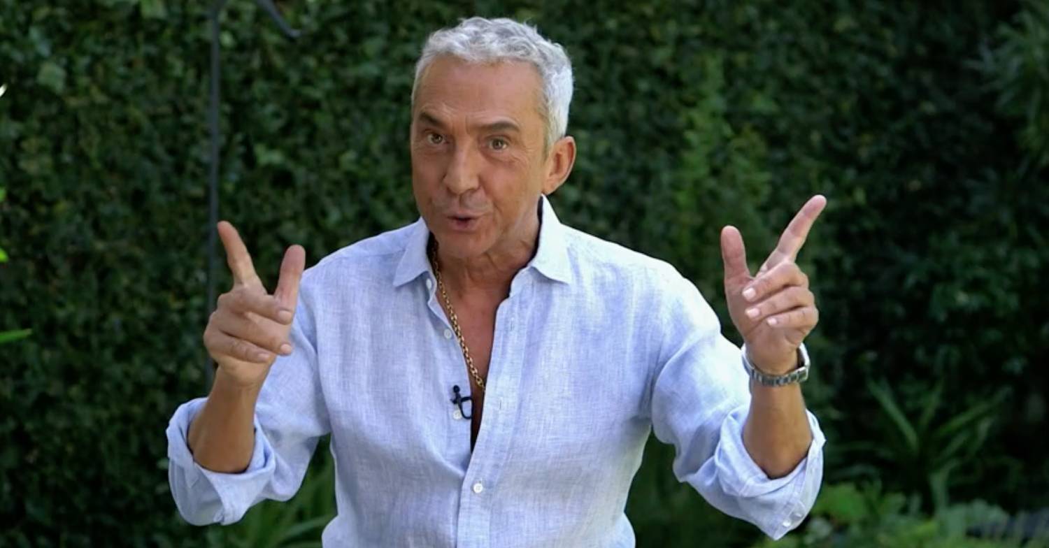 Bruno Tonioli points his fingers in the air