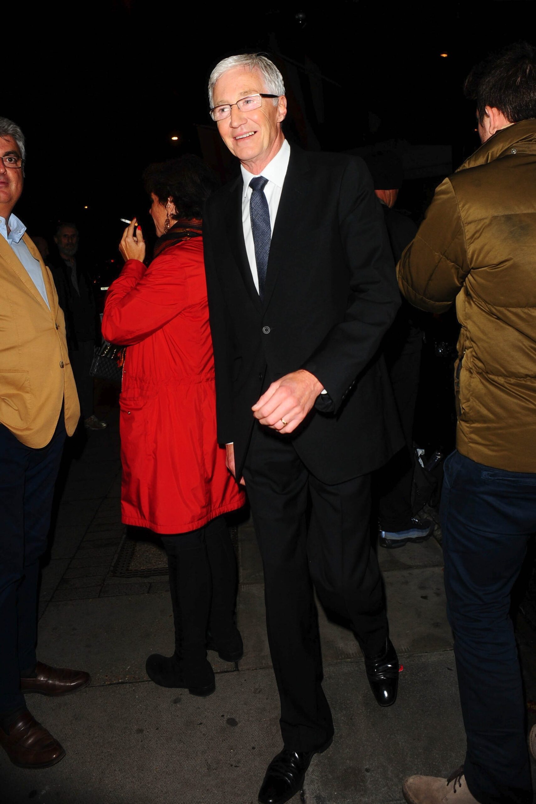 TV presenter Paul O'Grady wearing a suit